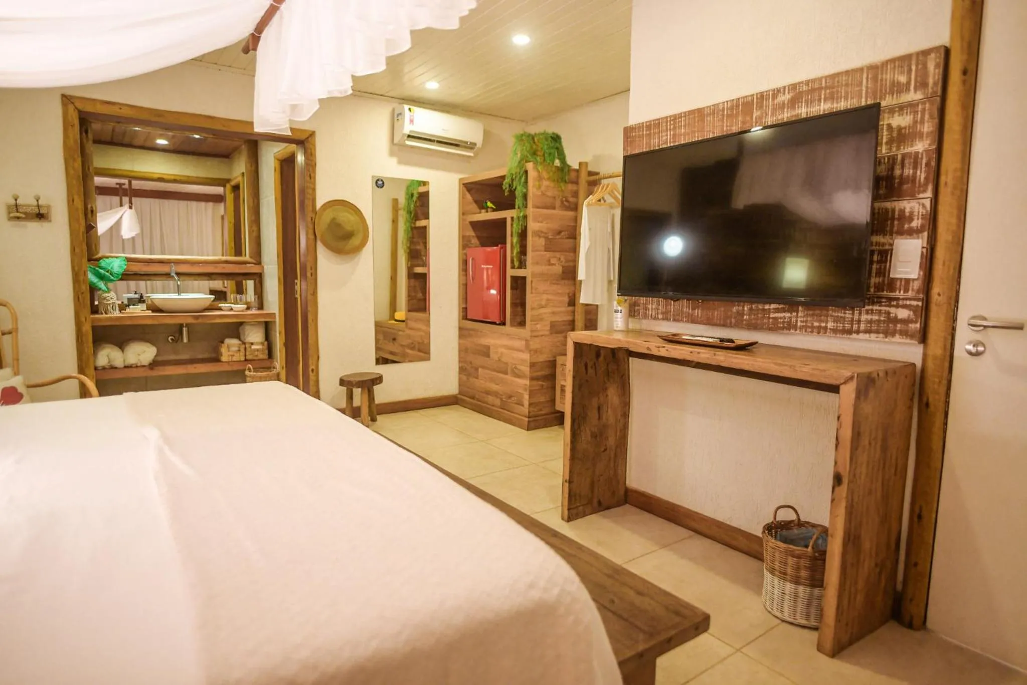 Communal lounge/ TV room, Bed in Ecocharme Pousada do Marcilio