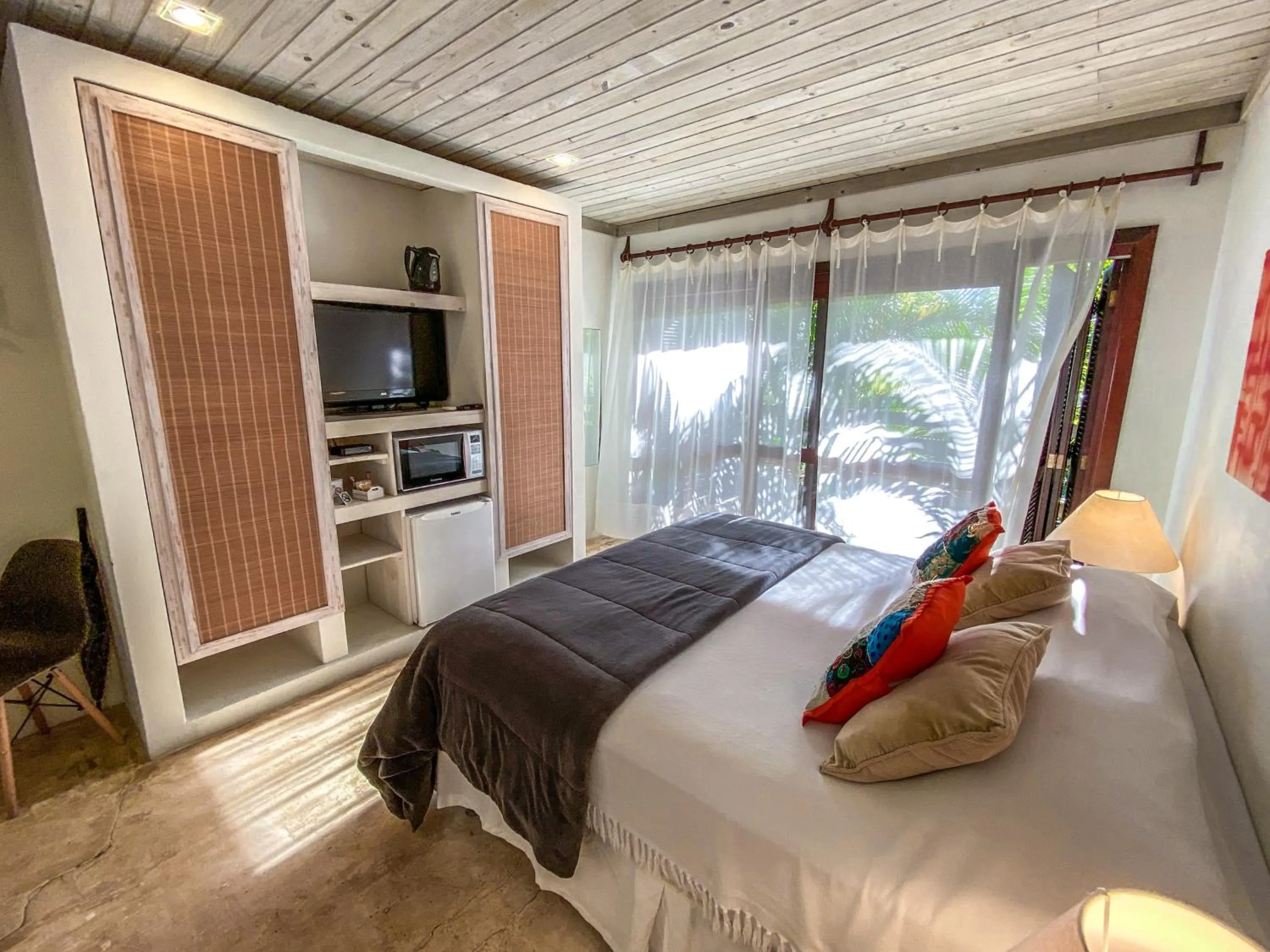 Bed in Morada da Praia do Rosa Pousada