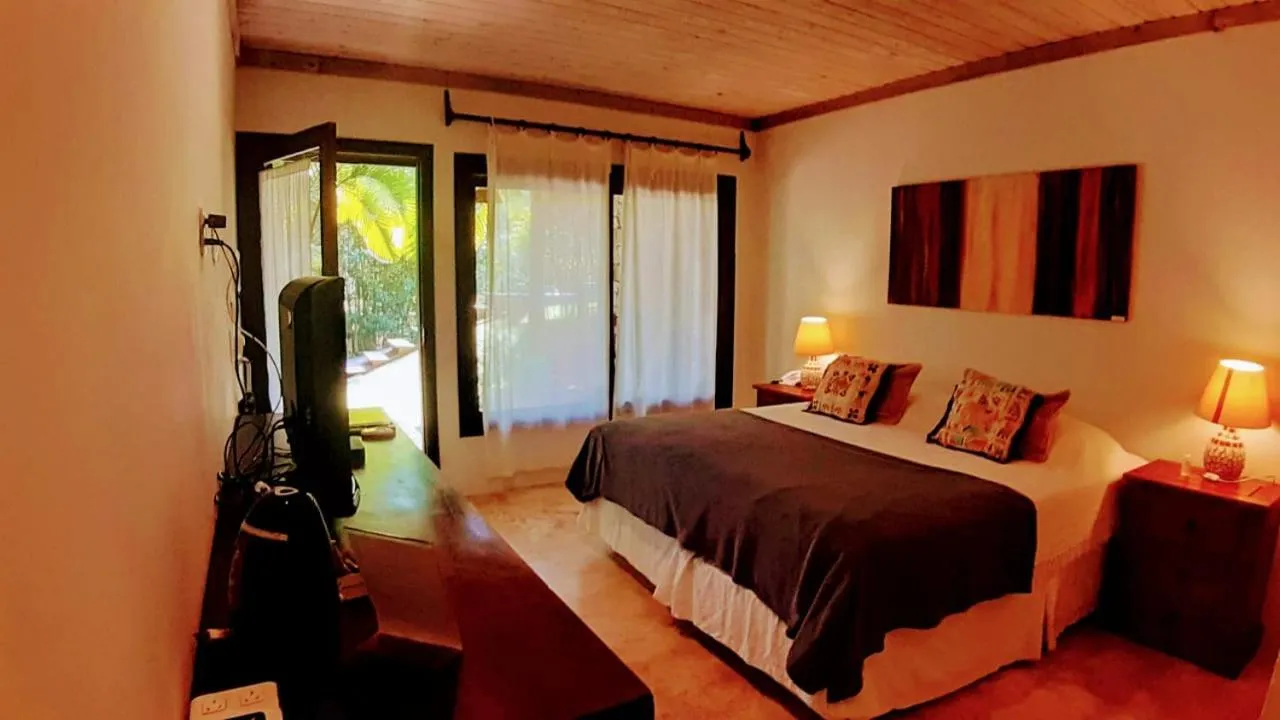 Bed in Morada da Praia do Rosa Pousada