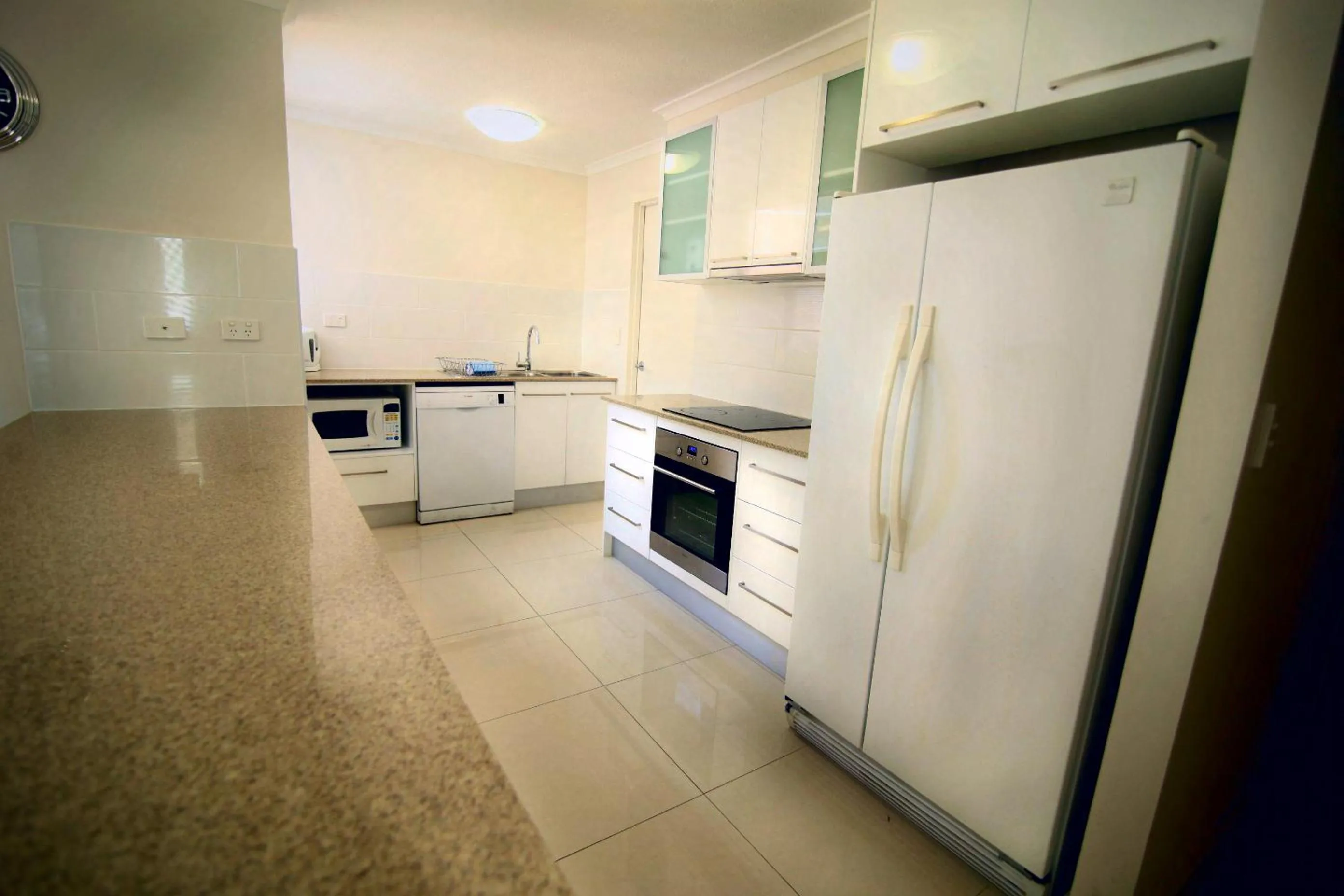 kitchen in Grosvenor Beachfront Apartments Surfers Paradise
