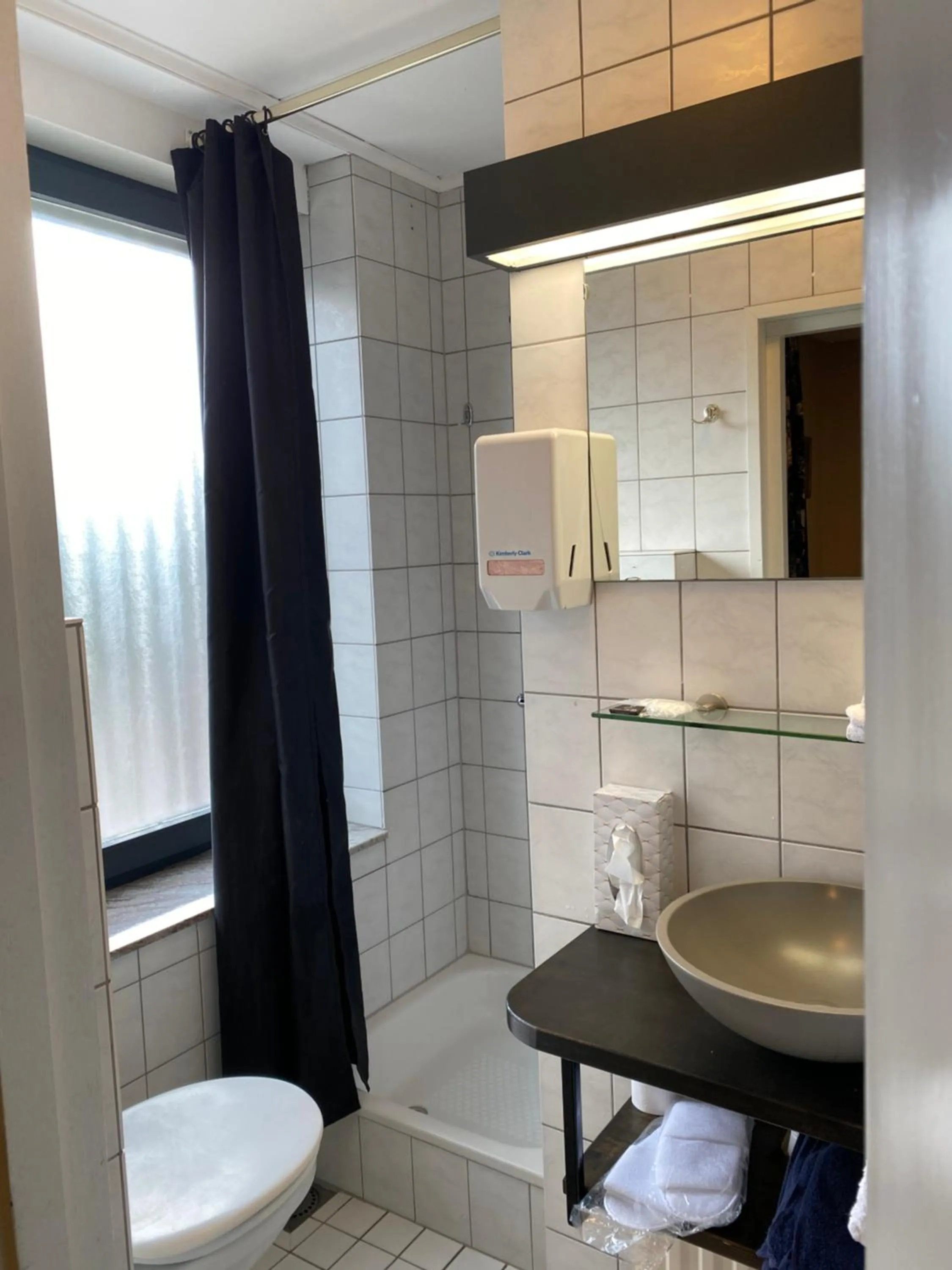 Shower in De Post B&B Restaurant