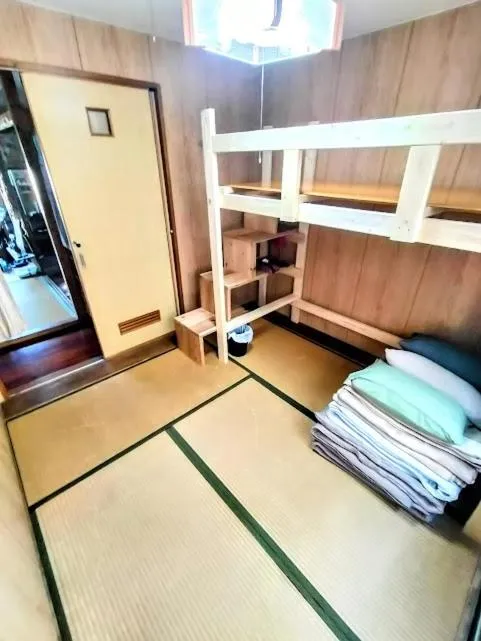 Bed in Minshuku Agaihama