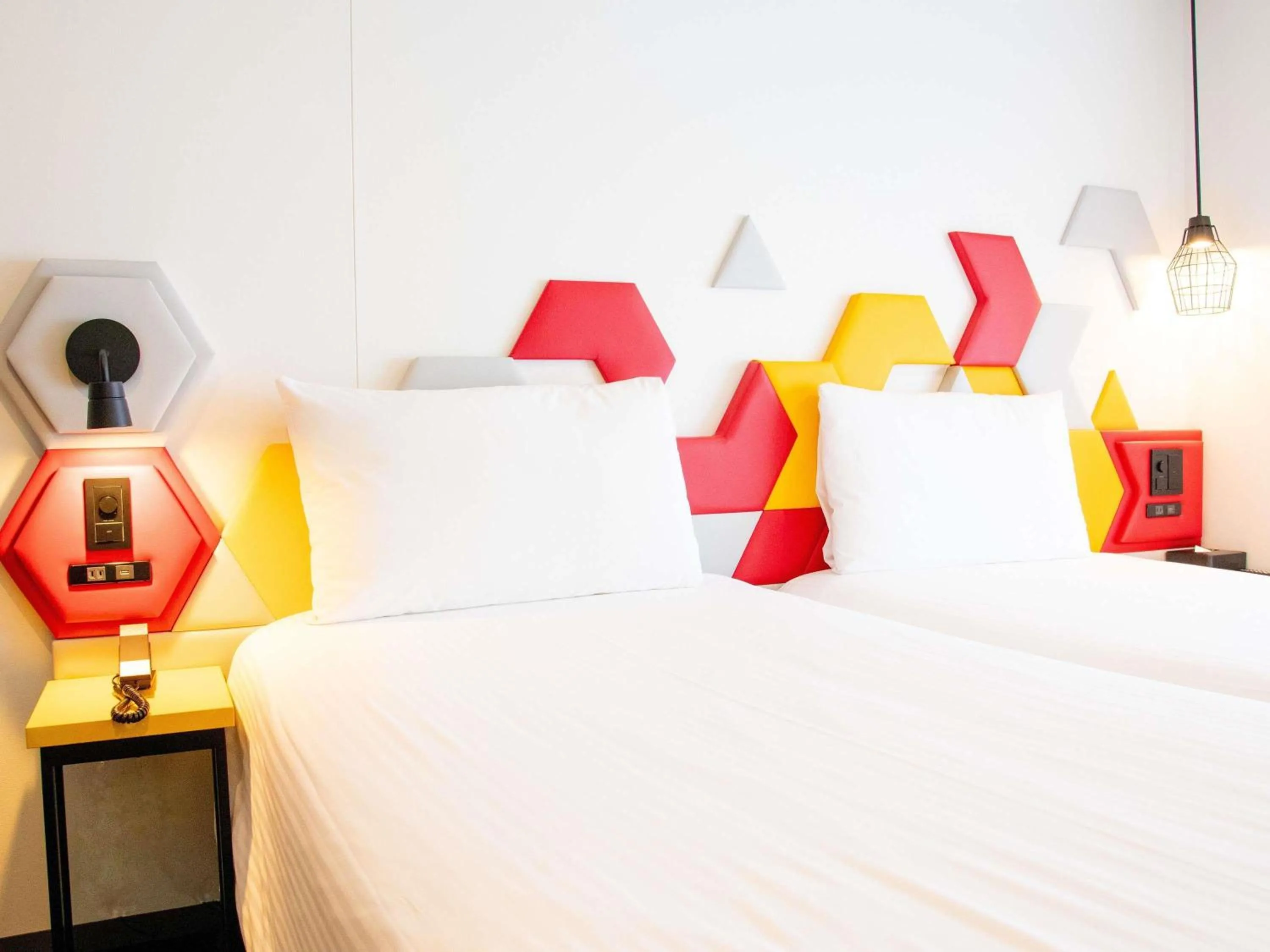 Bed in ibis Styles Tokyo Bay