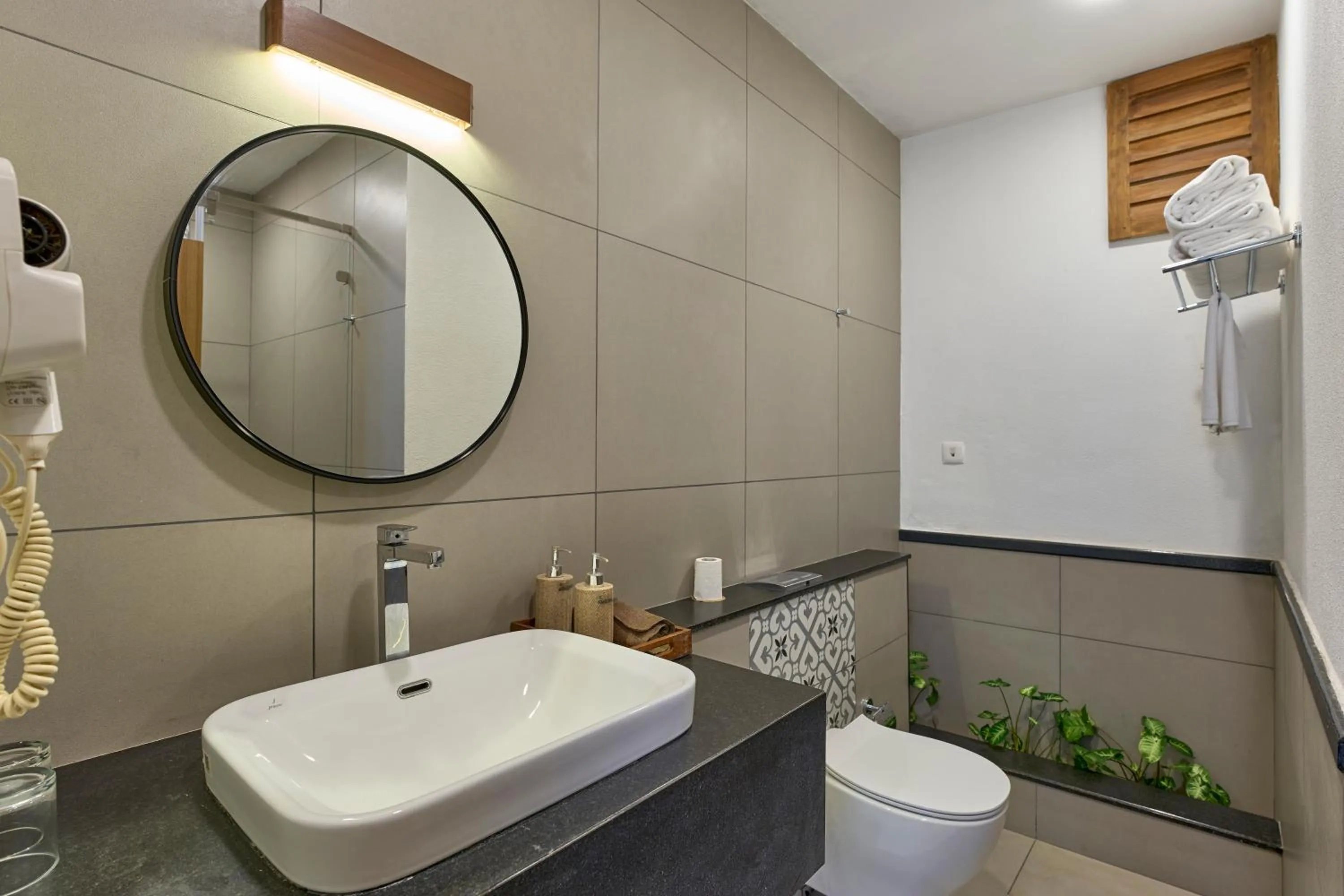 Bathroom in Cardamom County by Xandari