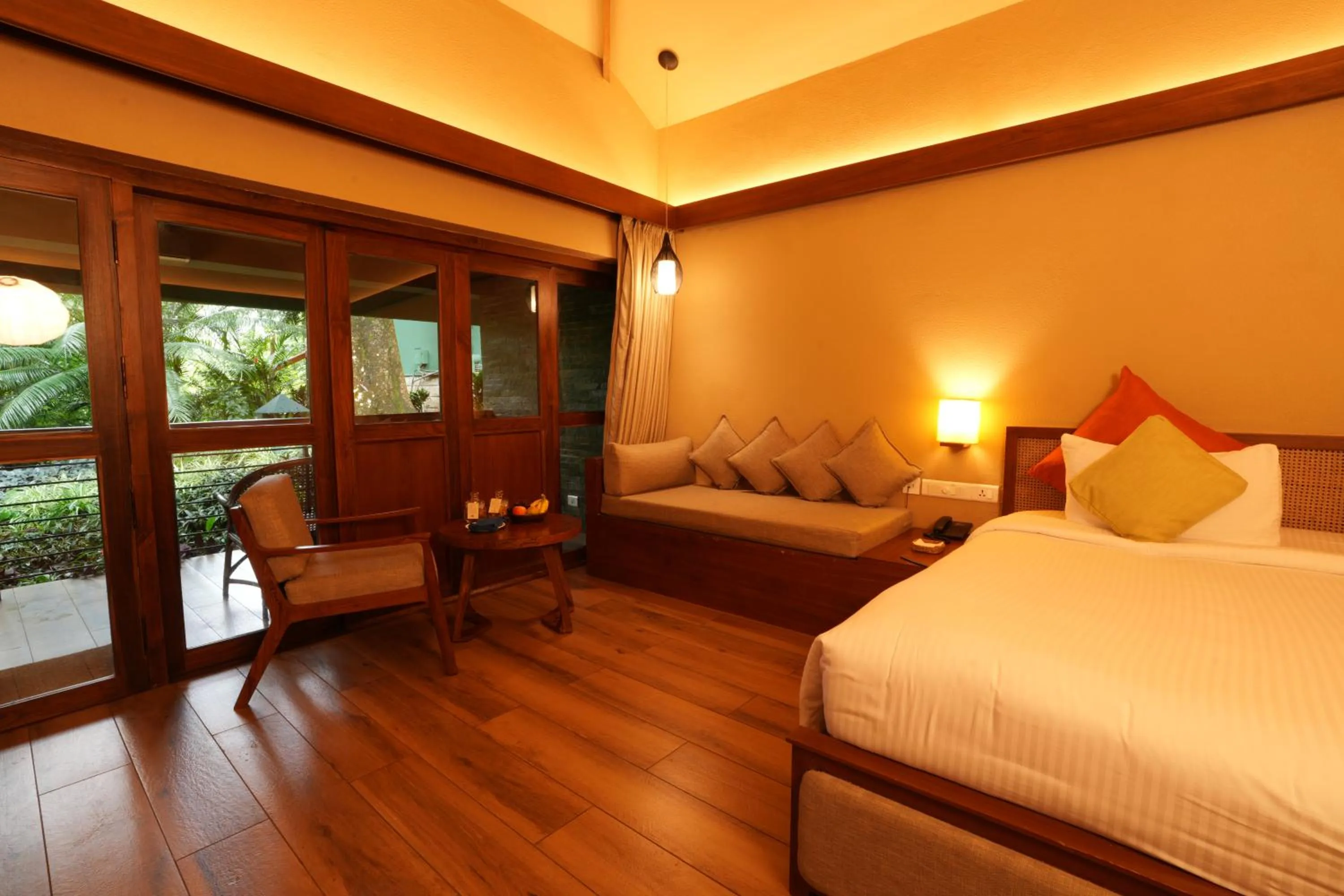 Seating area, Bed in Cardamom County by Xandari