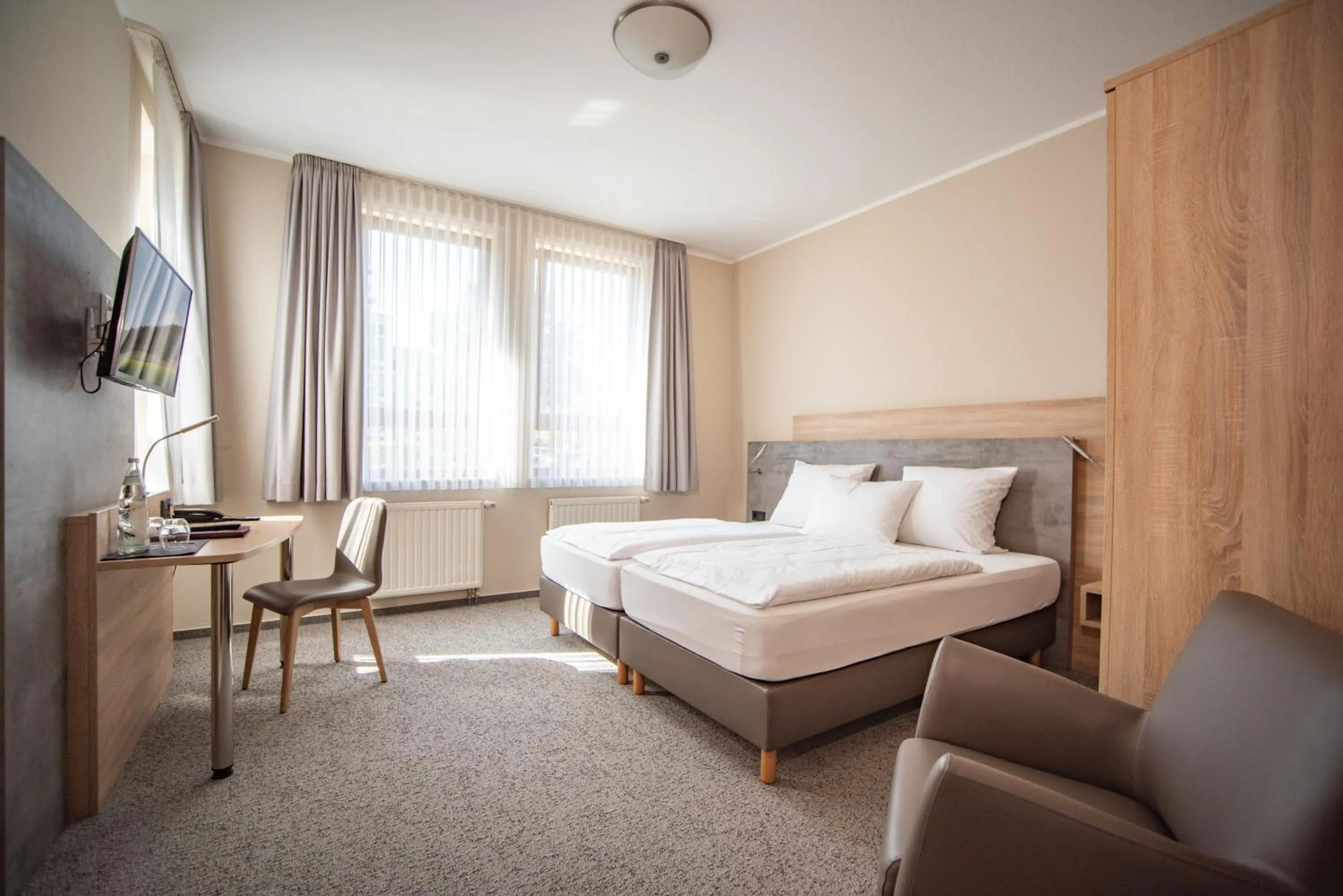 Photo of the whole room, Bed in Hotel Hollmann