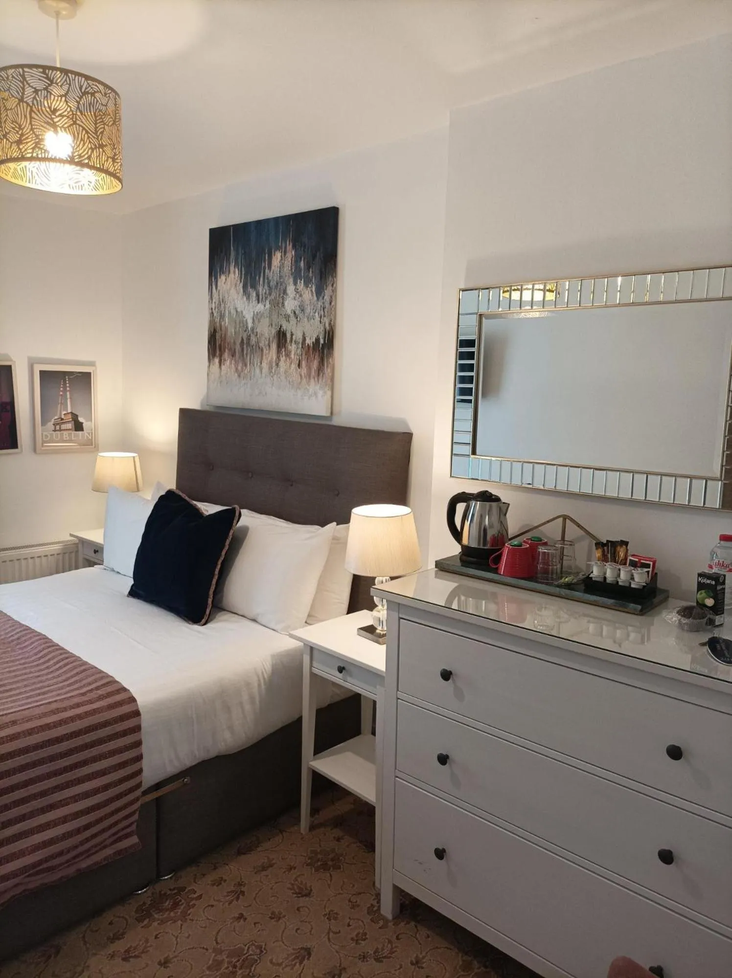 Bed in Tom Dick and Harriet's Accommodation