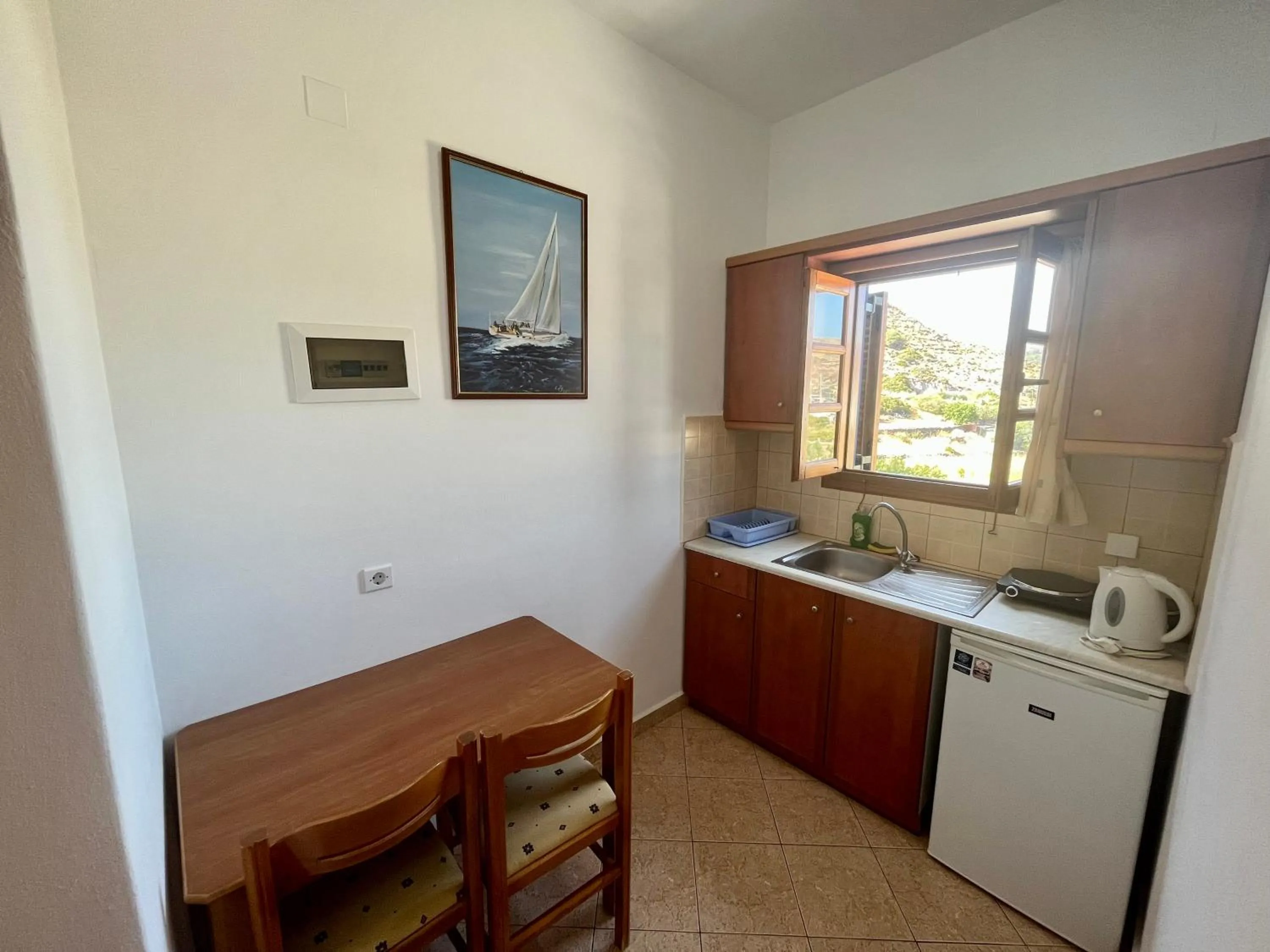 Kitchen or kitchenette in Nicolas Studios