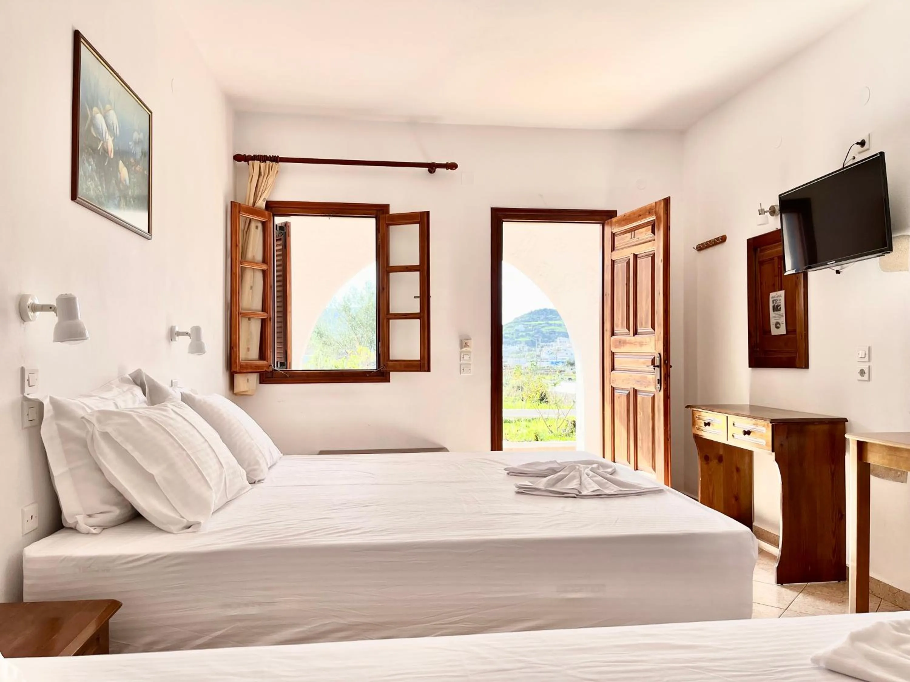 Photo of the whole room, Bed in Nicolas Studios