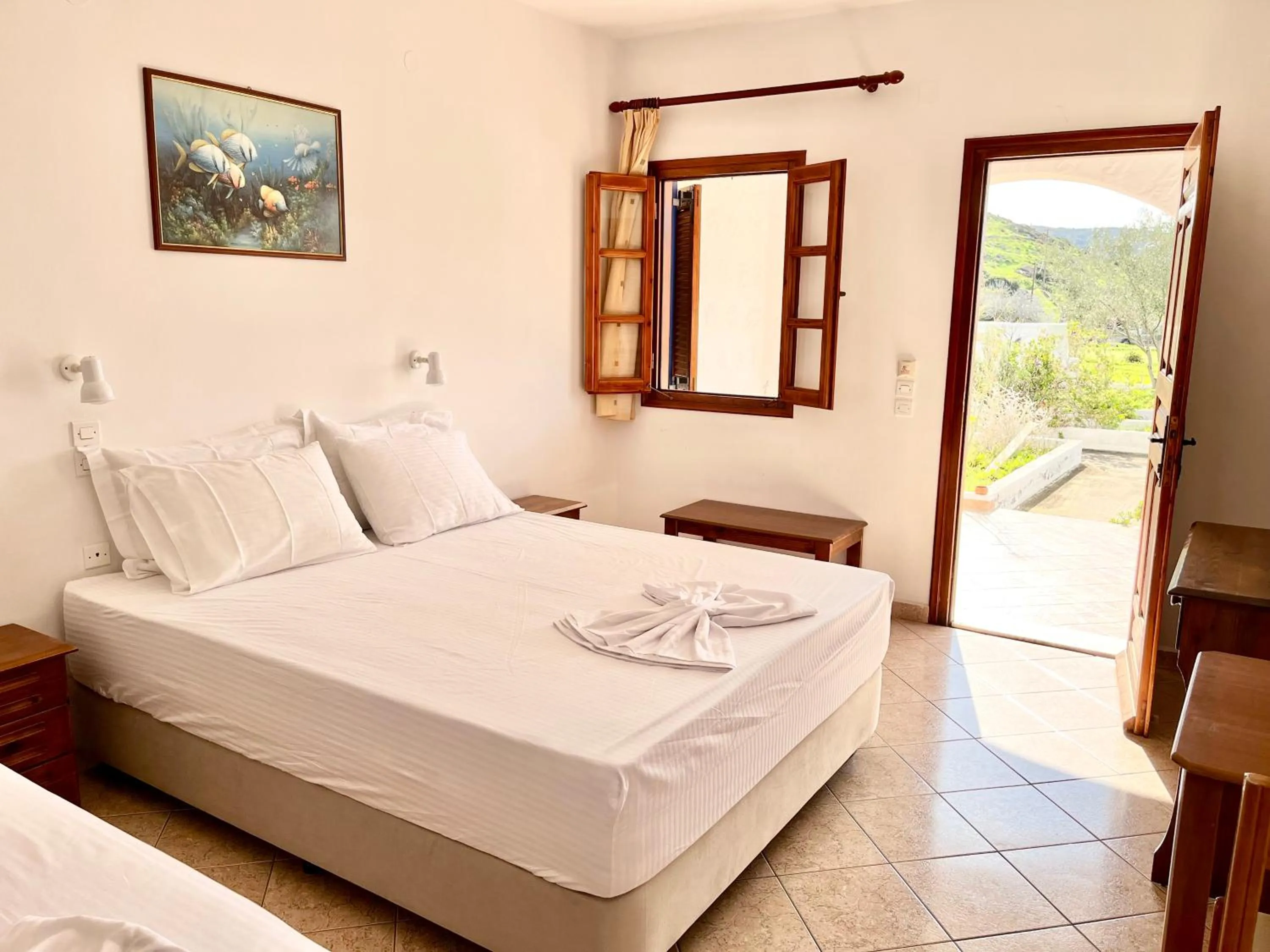 Photo of the whole room, Bed in Nicolas Studios