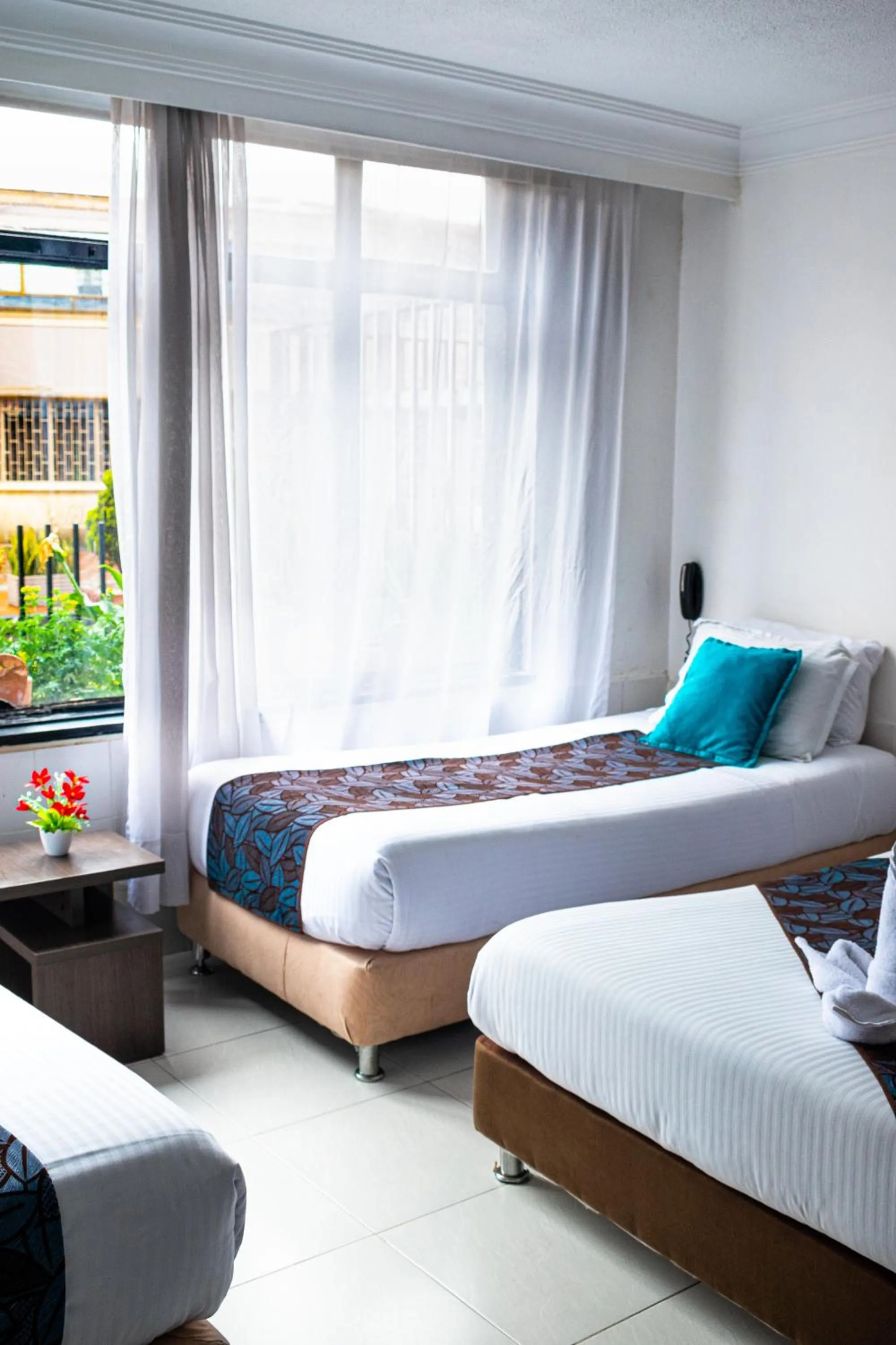 Bedroom, Bed in Hotel Central House a 5 min de la Embajada Americana