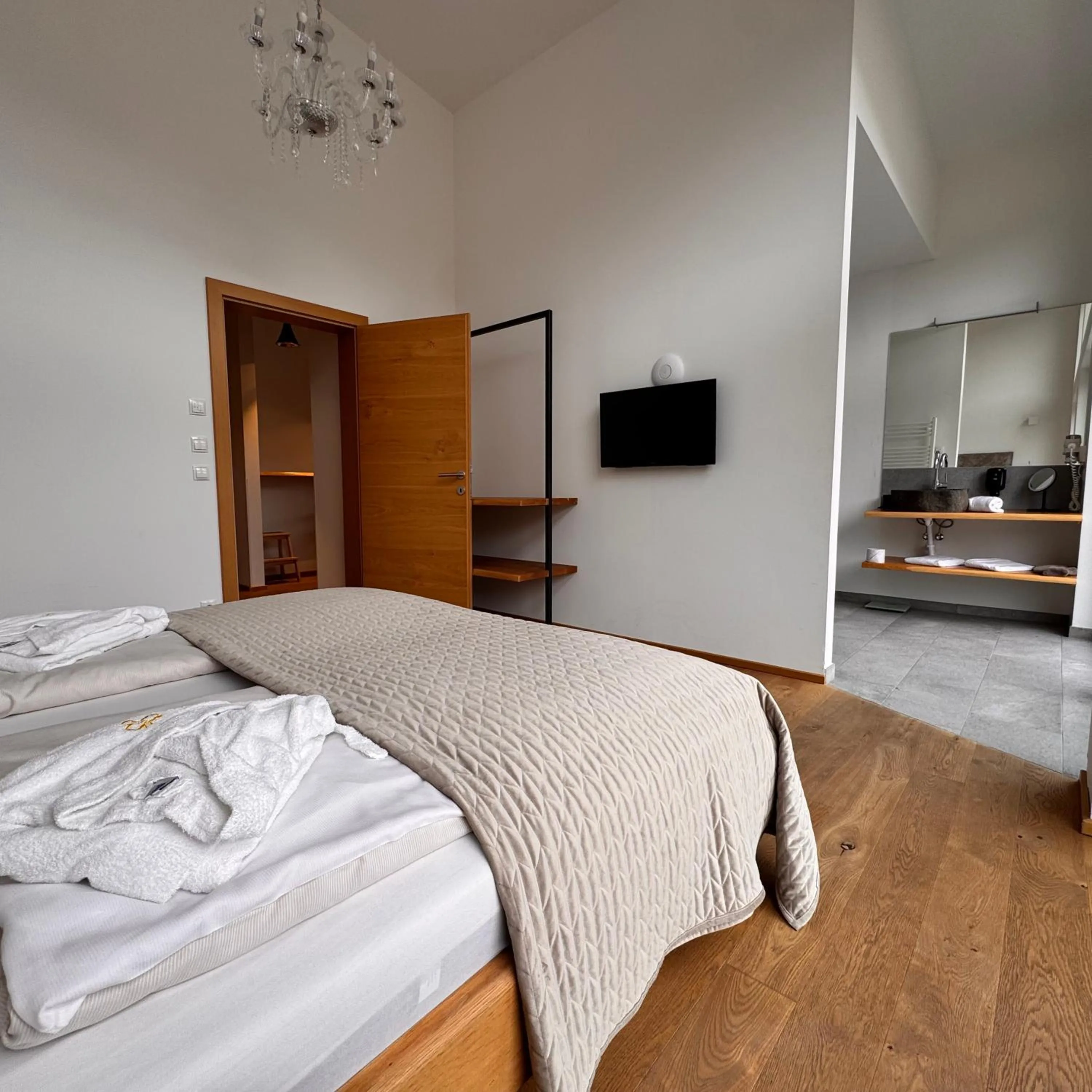 Bed in Boutique Aparthotel Chalets Coburg