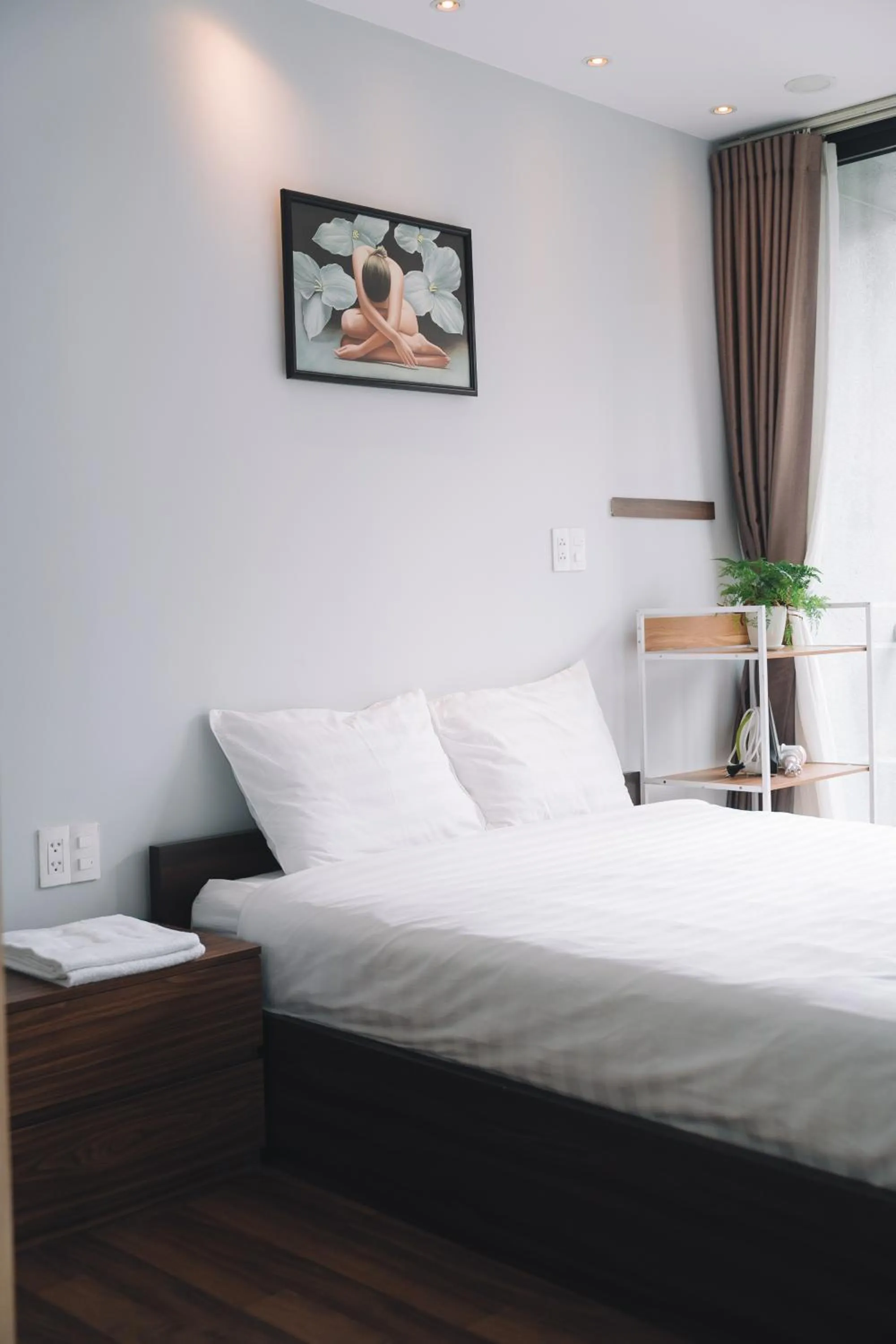 Photo of the whole room, Bed in Dalat Center Residence