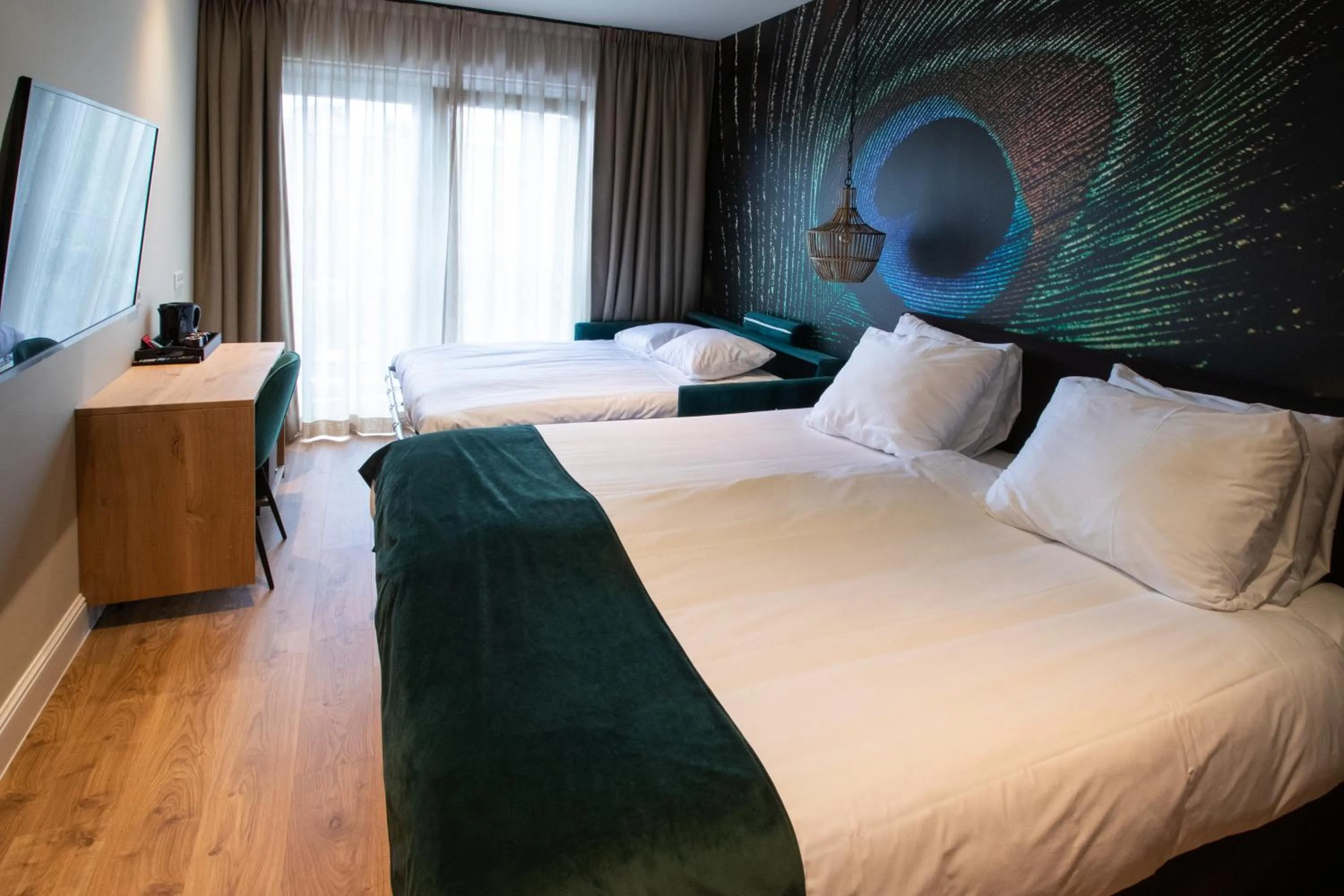 Bed in Hotel Sanders de Paauw