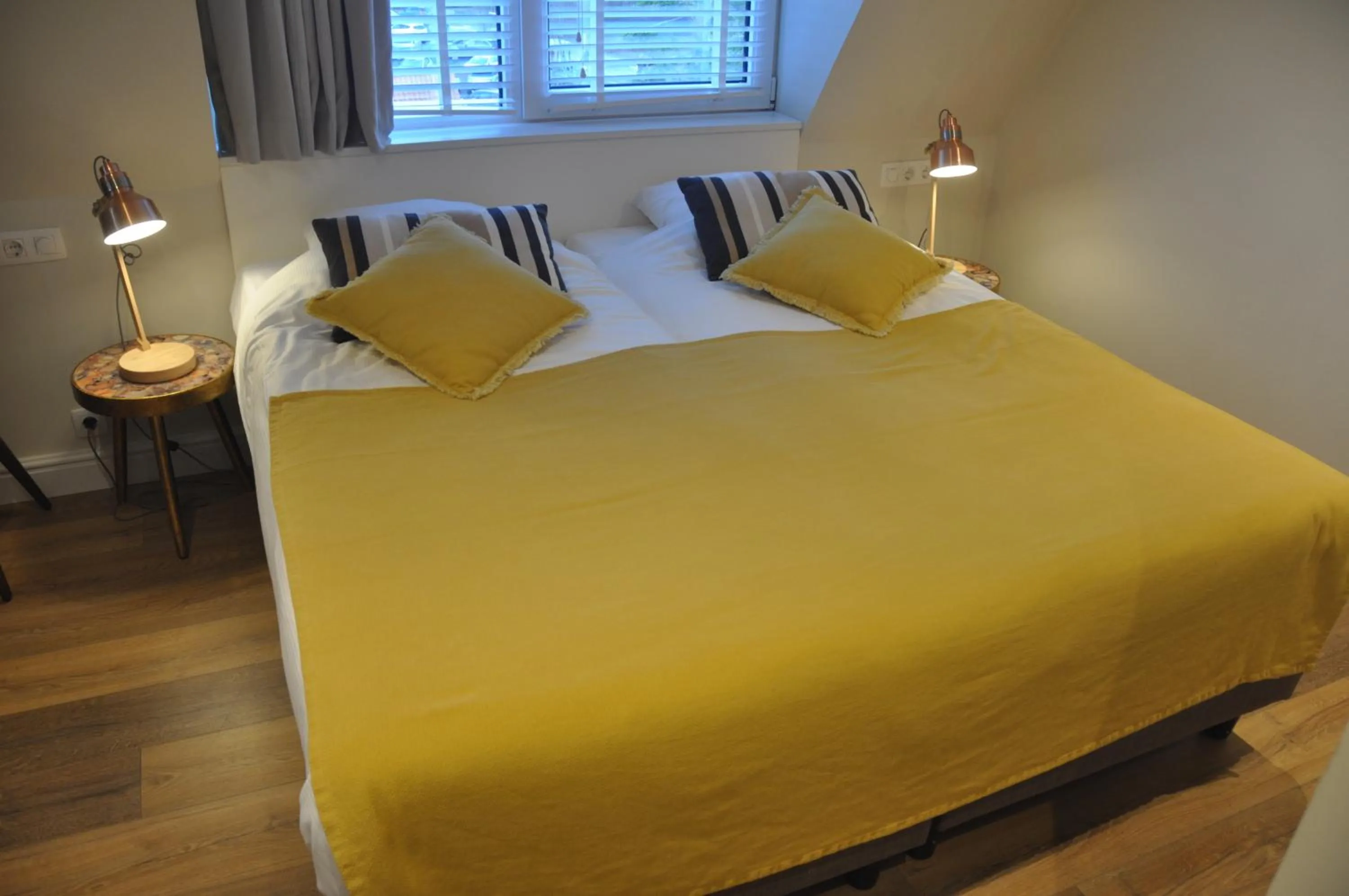 Bed in Hotel Sanders de Paauw