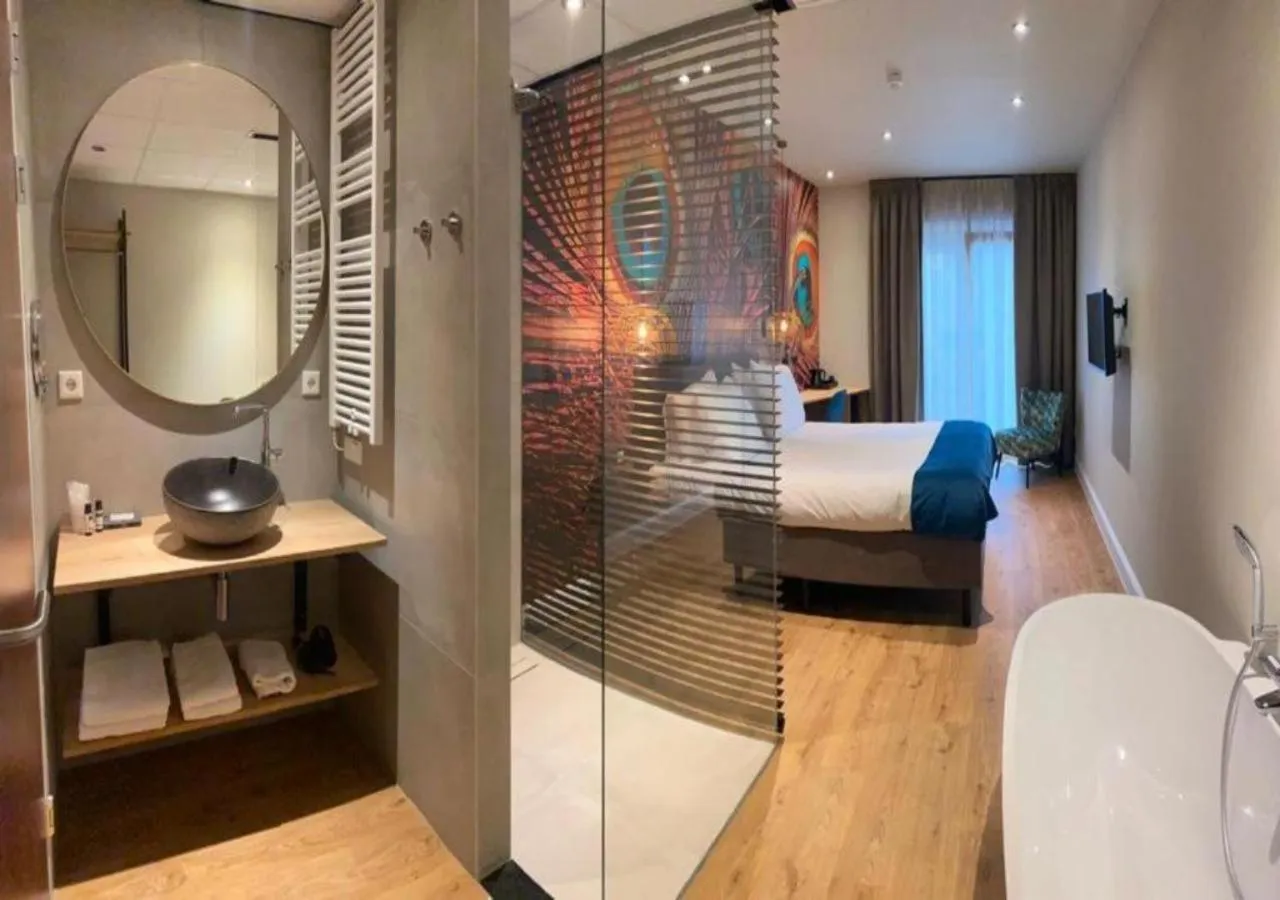 Bed in Hotel Sanders de Paauw