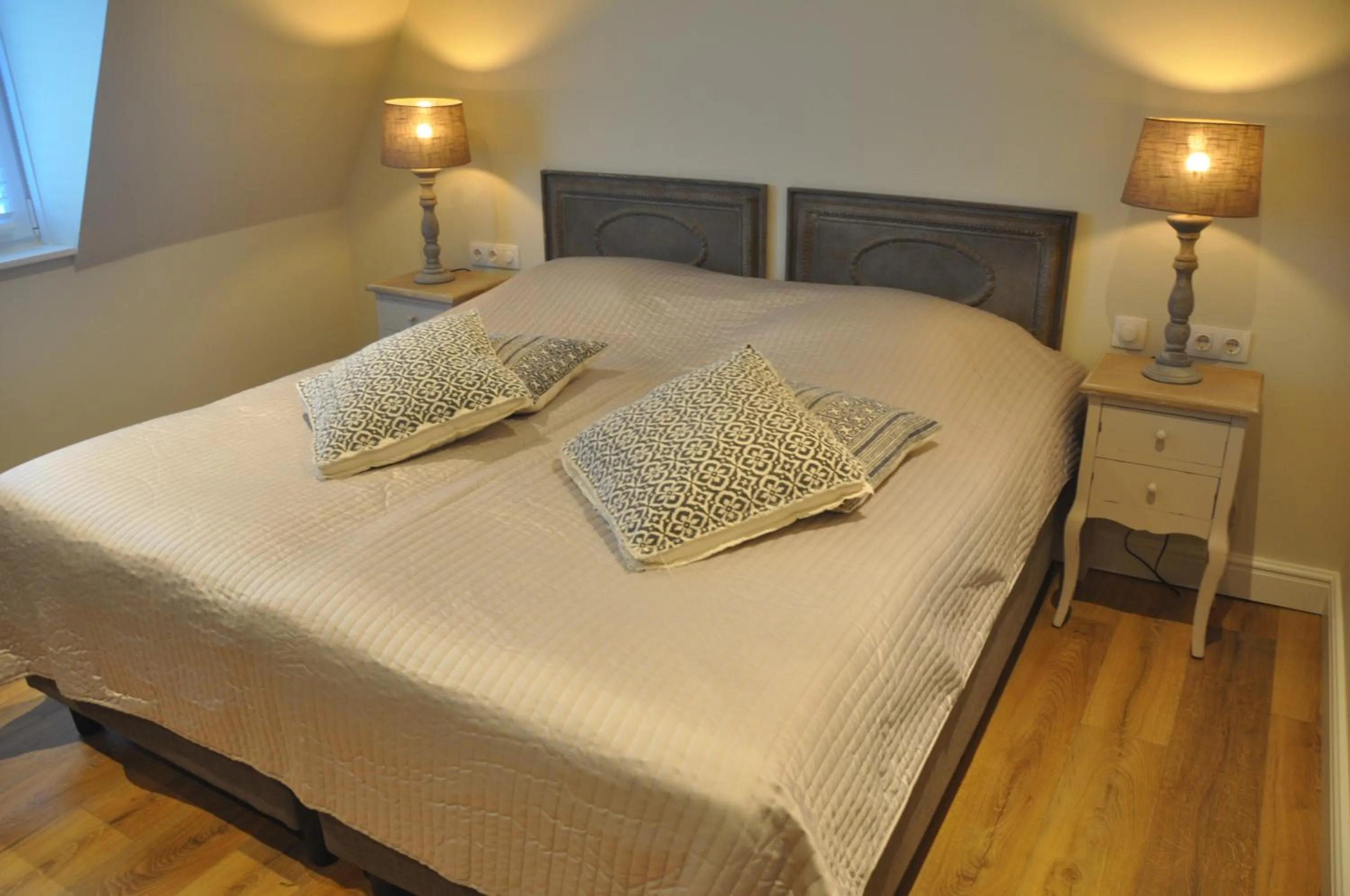 Bed in Hotel Sanders de Paauw