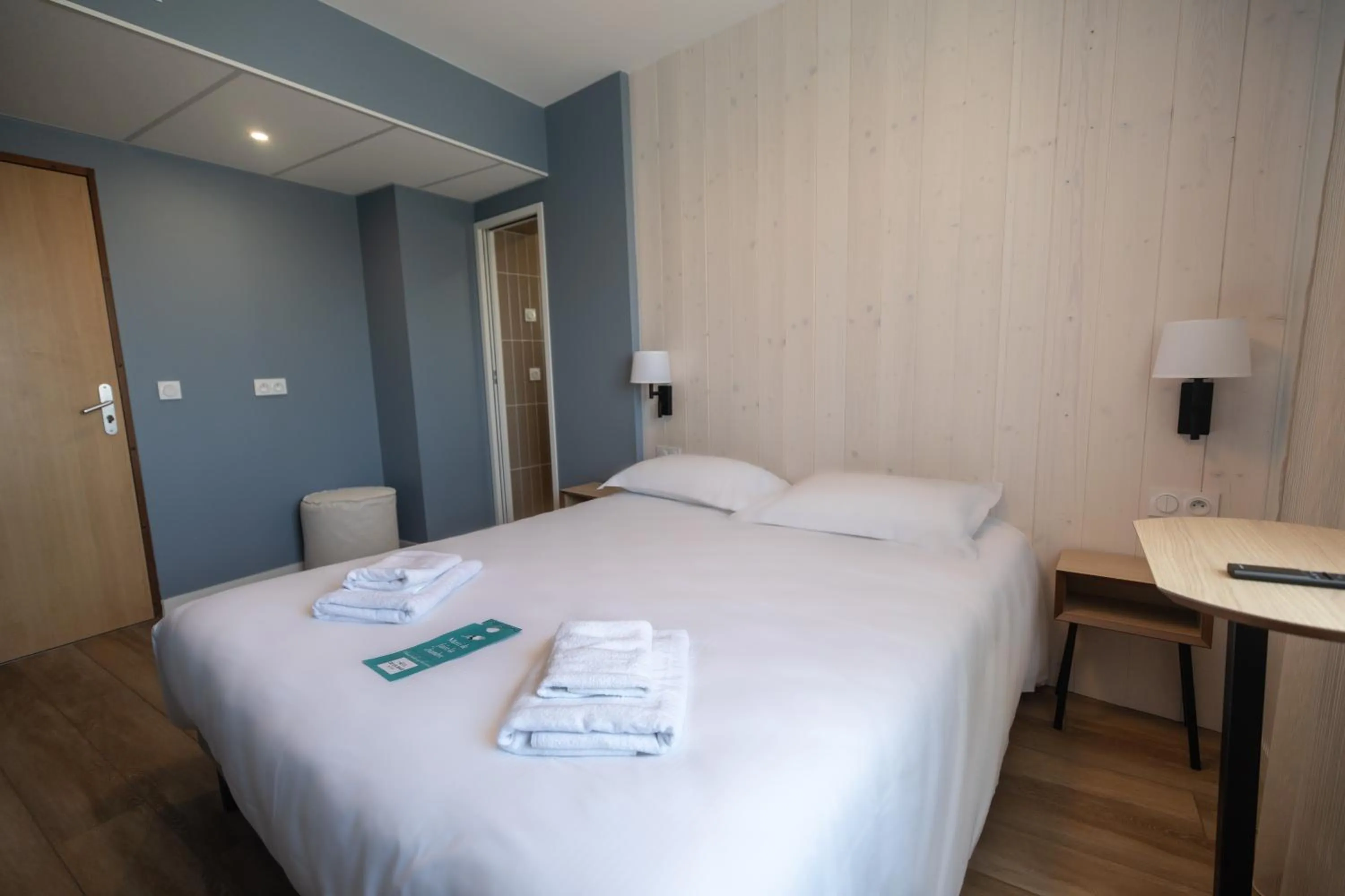 Bed in Hôtel de la Baie