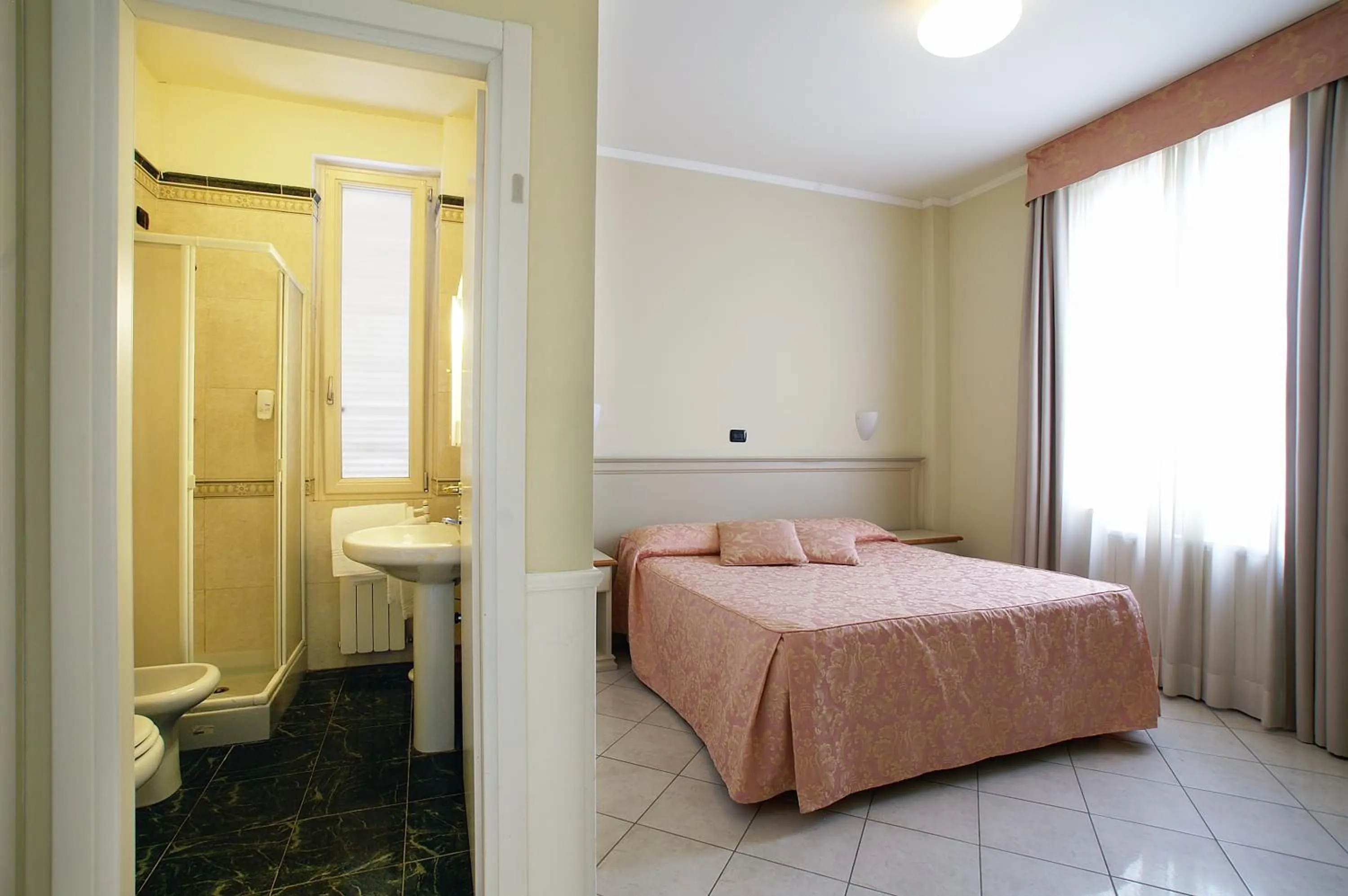 Bed in Hotel Coluccini