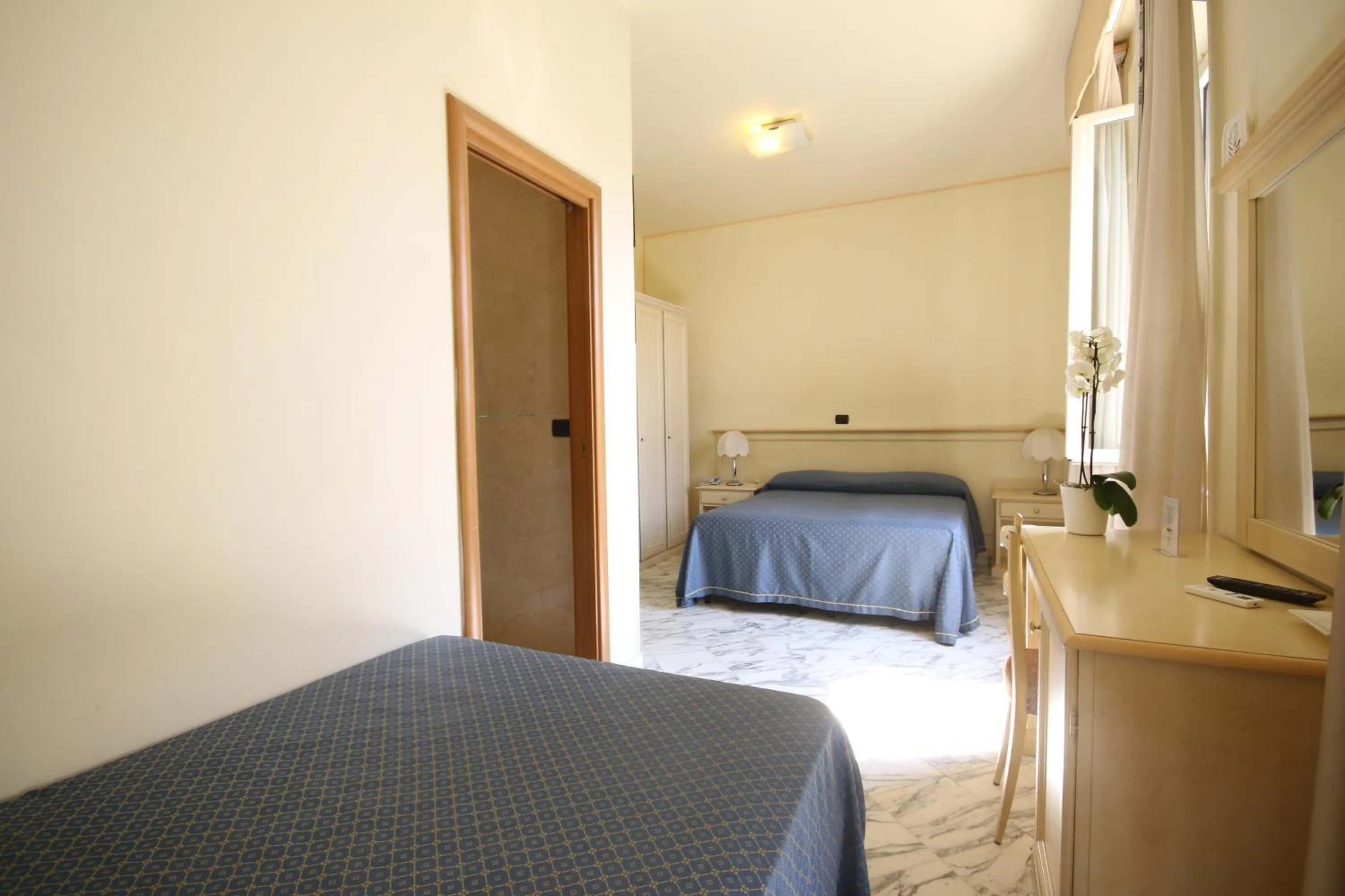 Bed in Hotel Coluccini