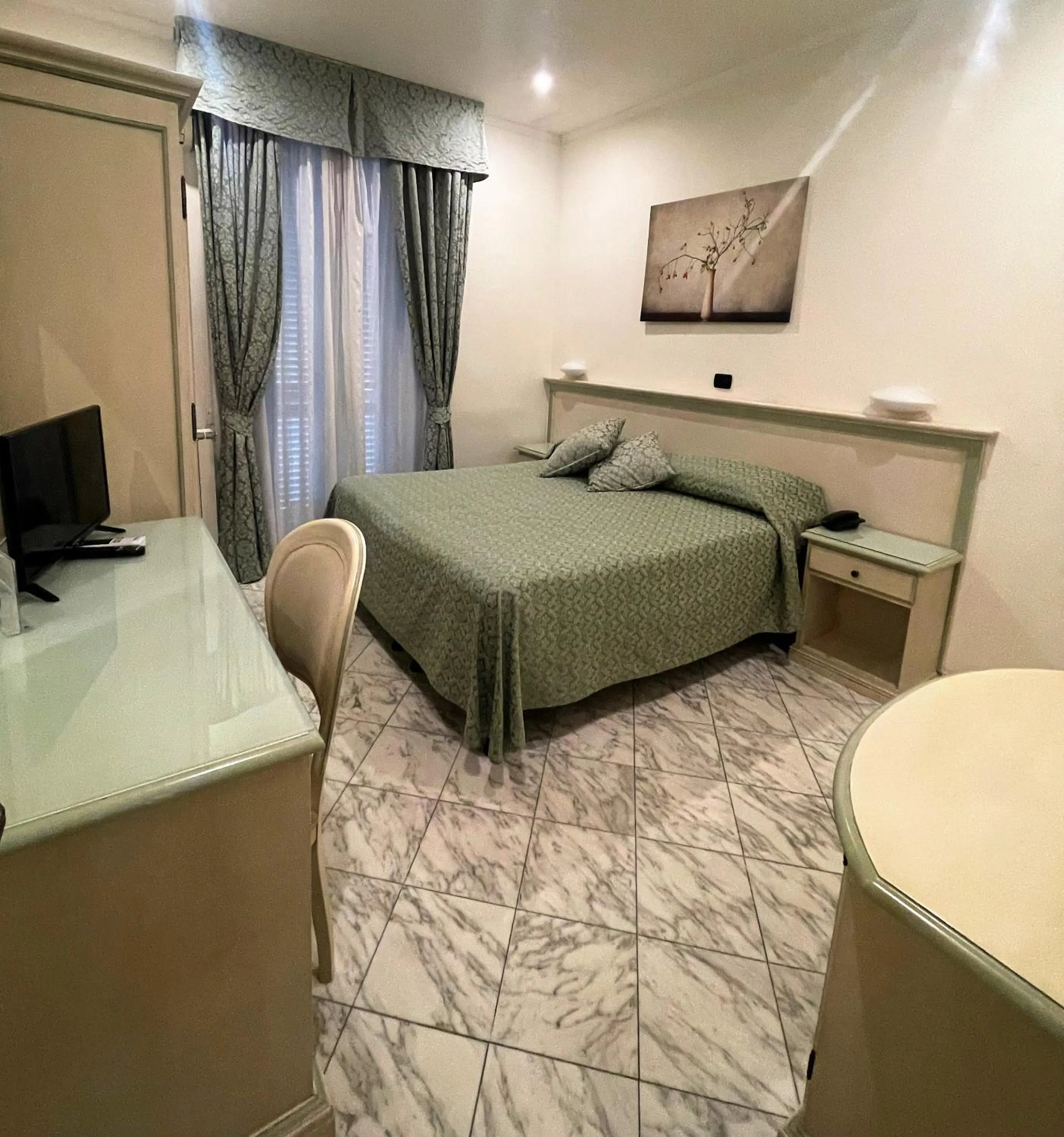 Bed in Hotel Coluccini