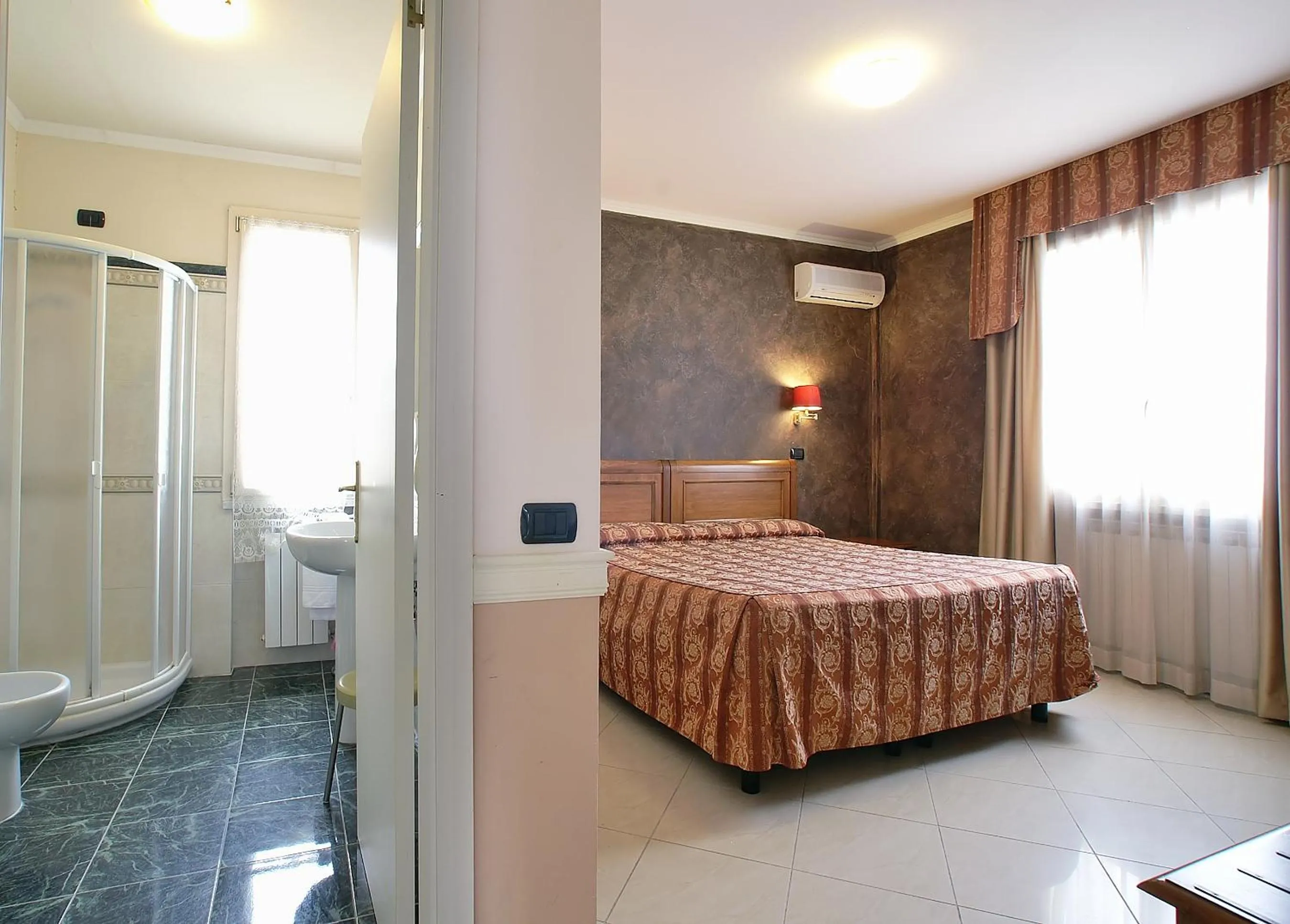 Bed in Hotel Coluccini