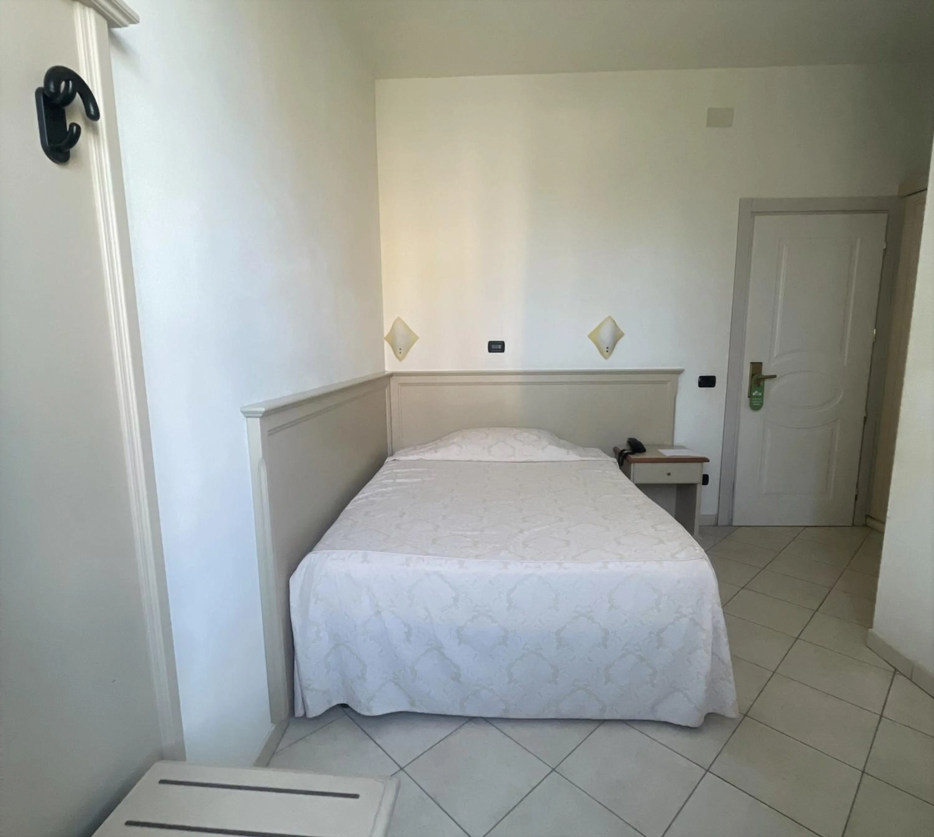 Bed in Hotel Coluccini