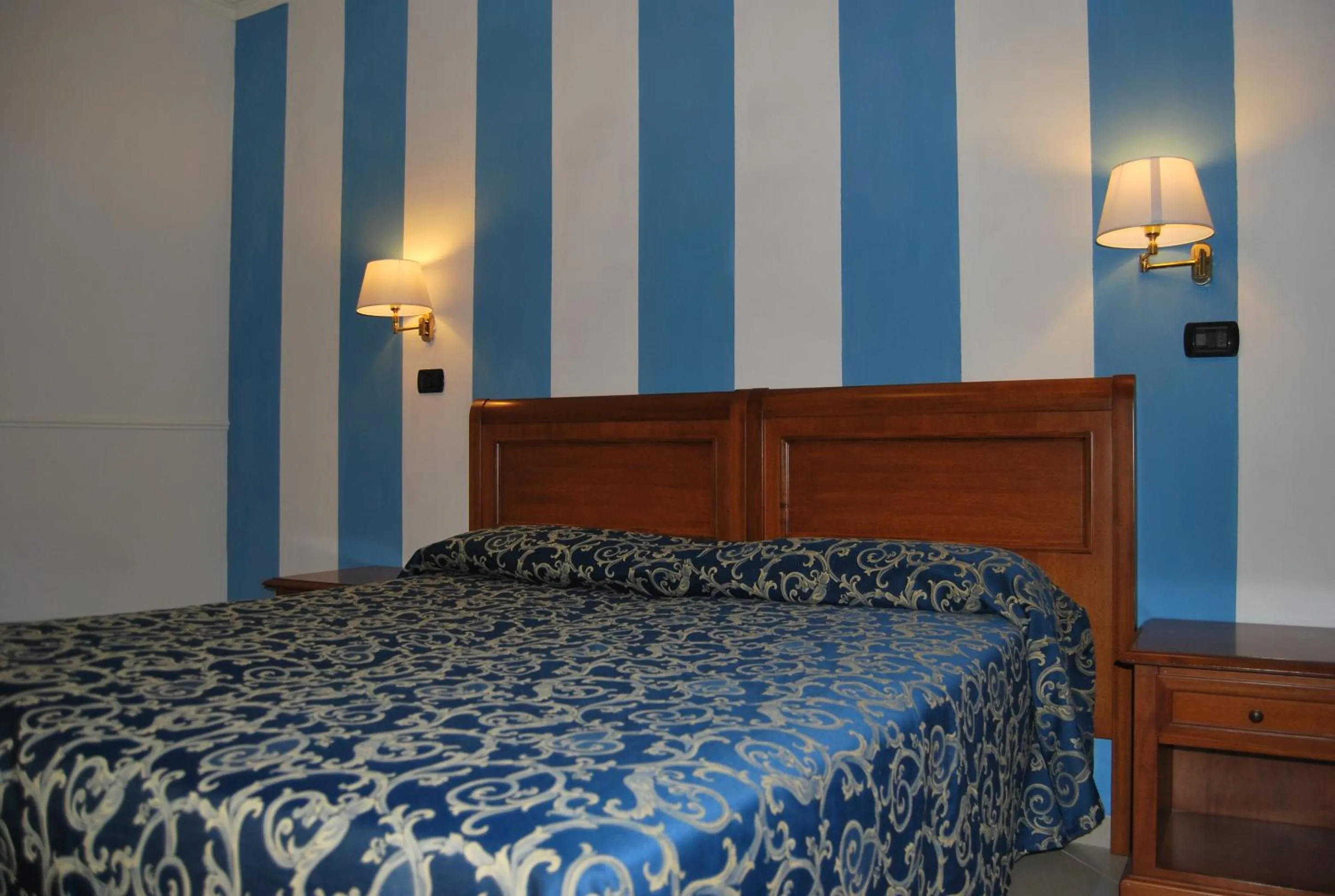 Bed in Hotel Coluccini