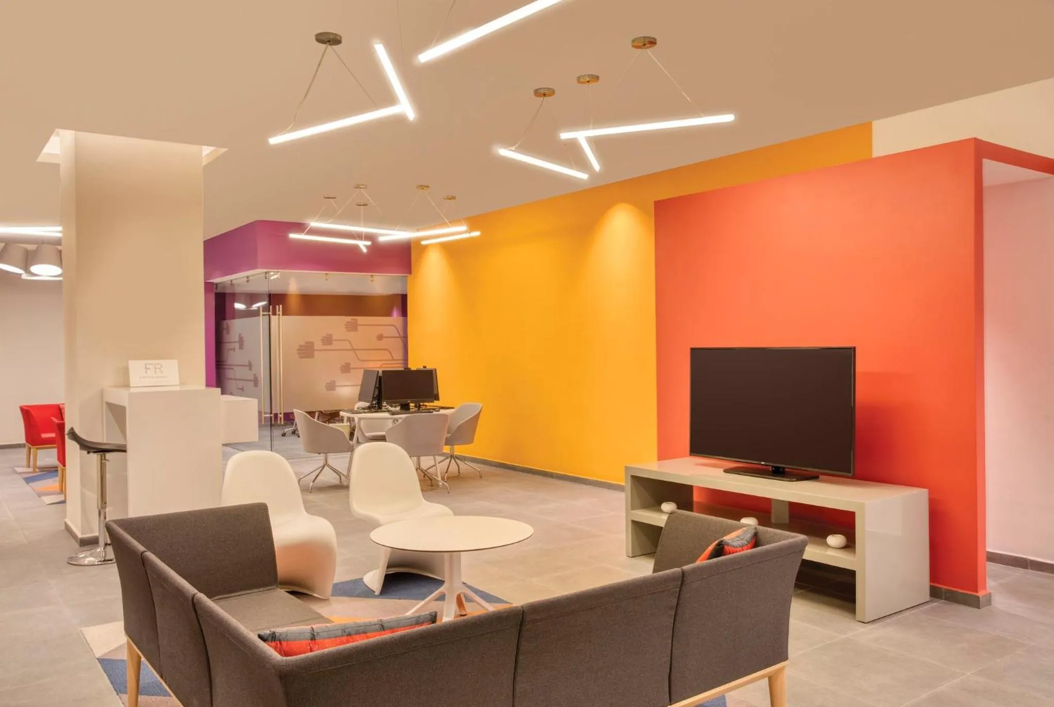 Living room in Fiesta Inn Express Puebla Explanada