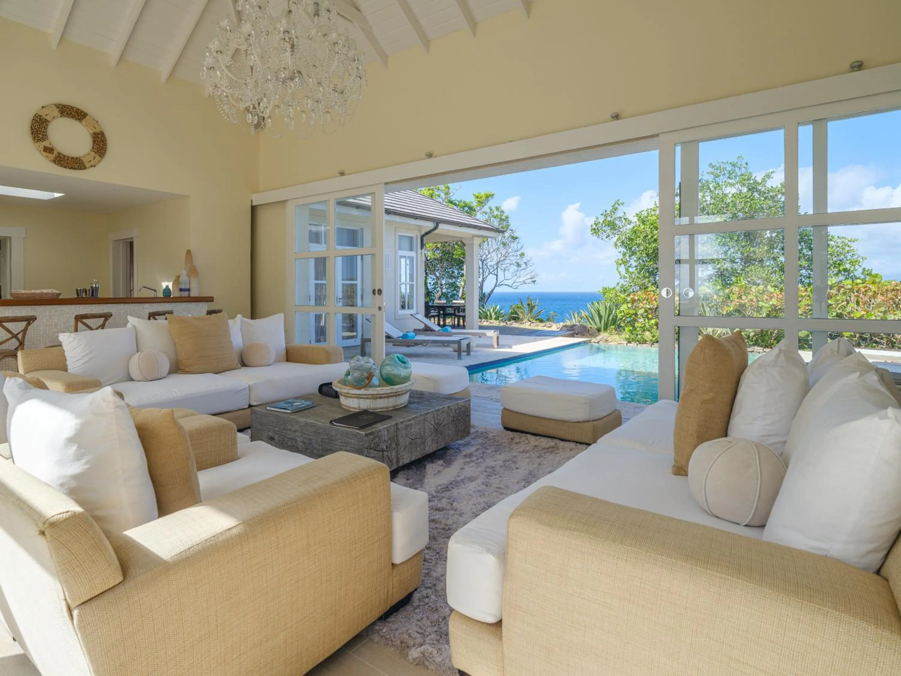 Communal lounge/ TV room in The Liming Bequia