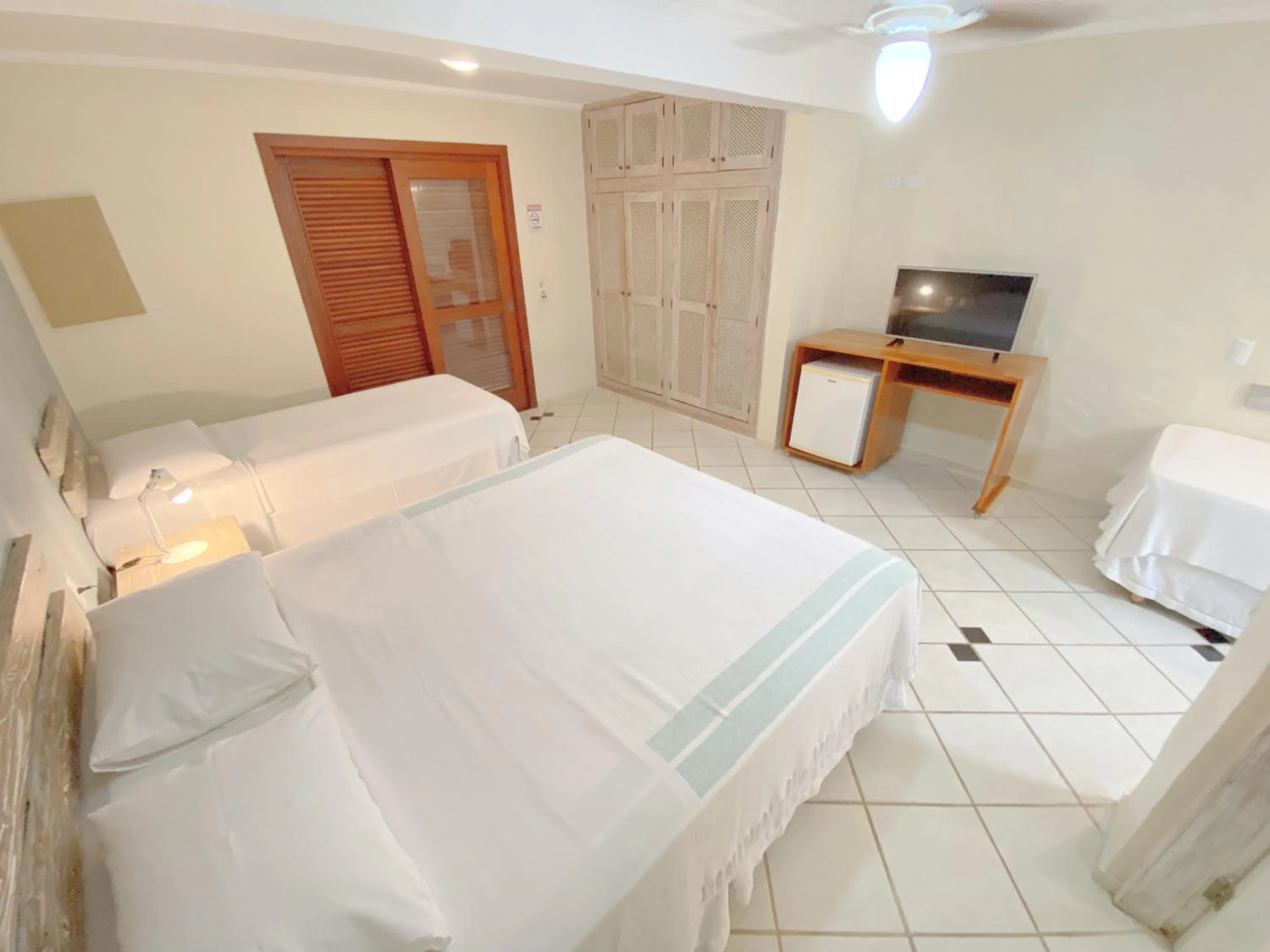Property building, Bed in Pousada Montemar