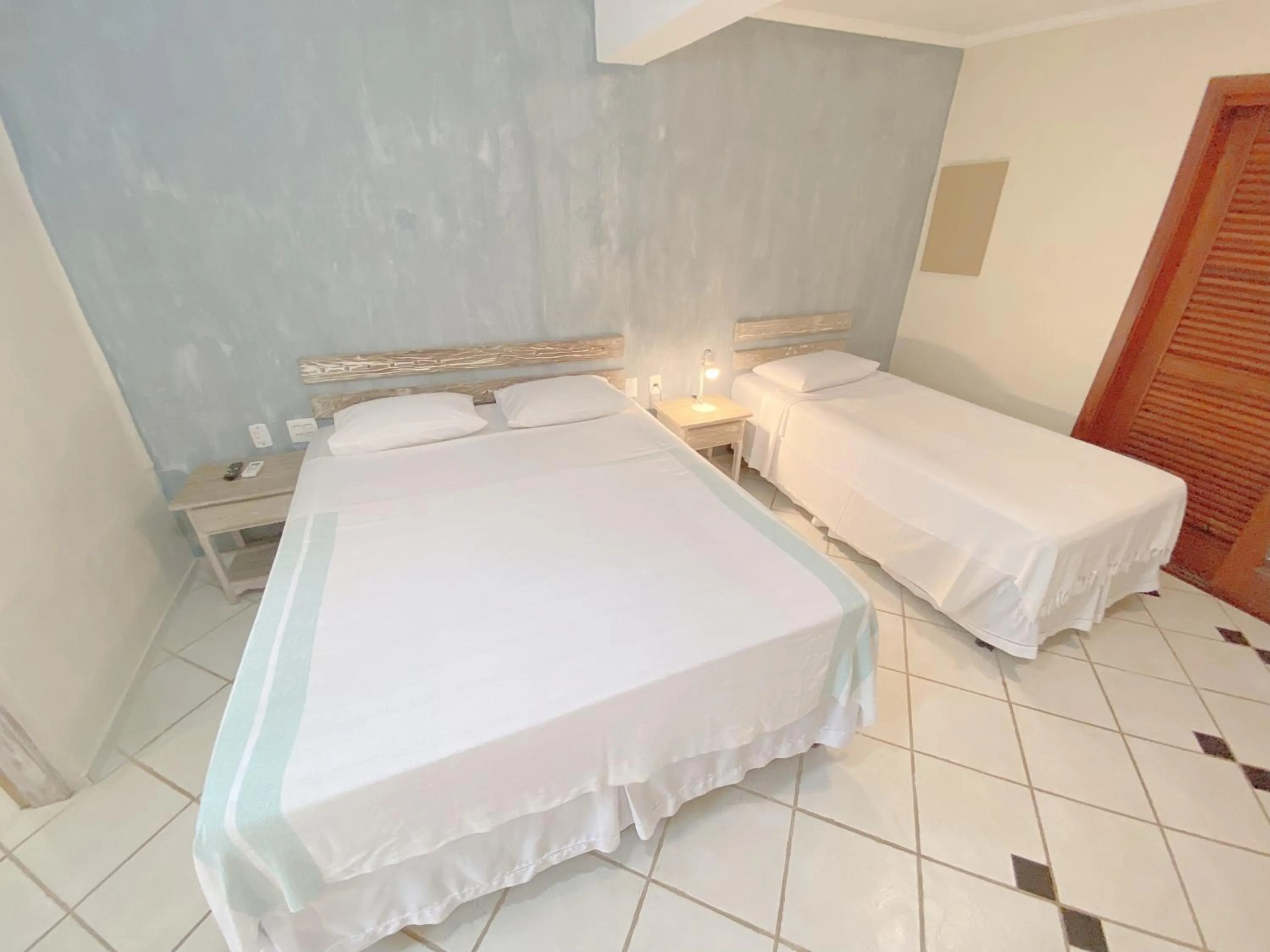 Property building, Bed in Pousada Montemar