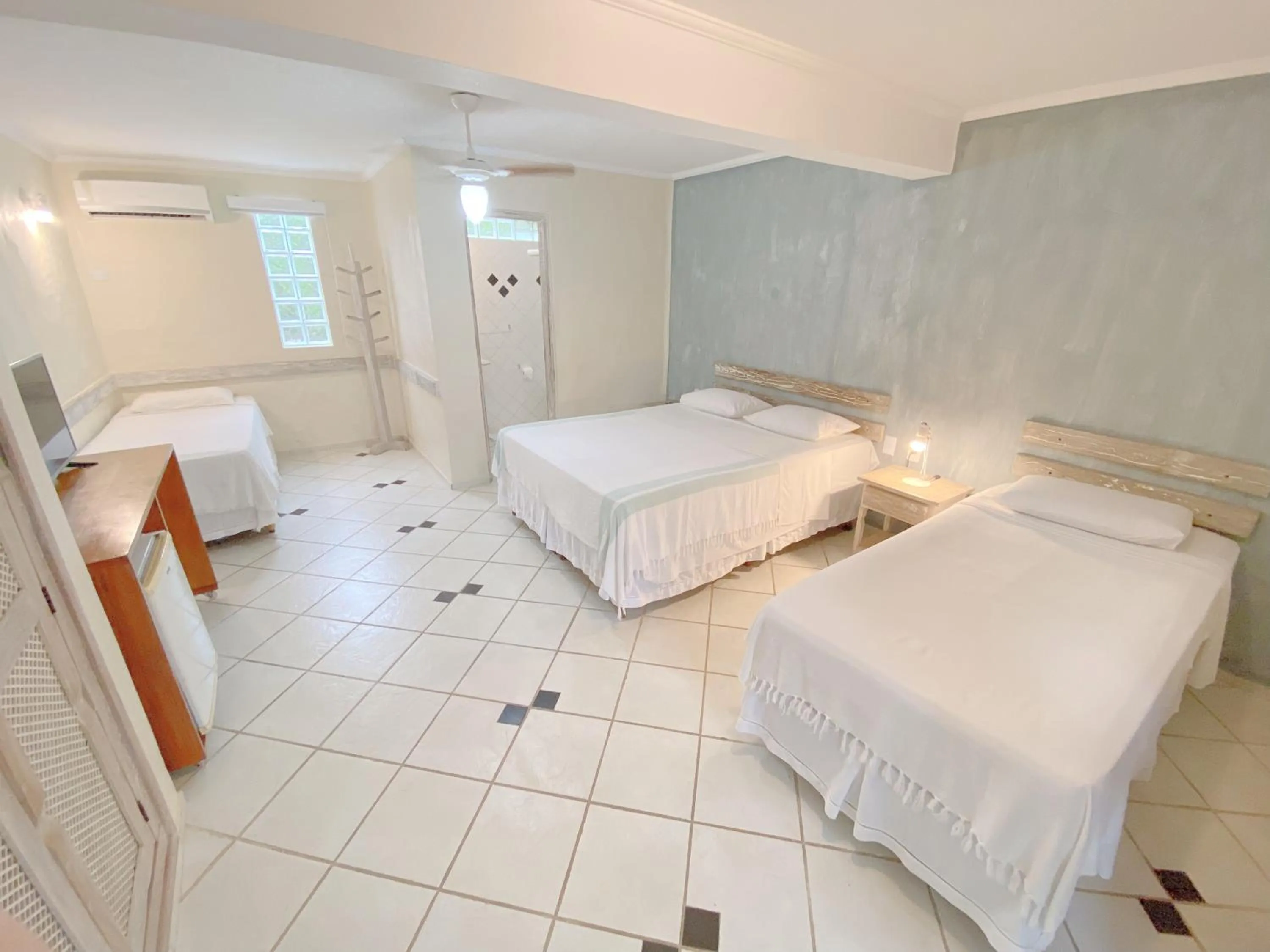 Property building, Bed in Pousada Montemar