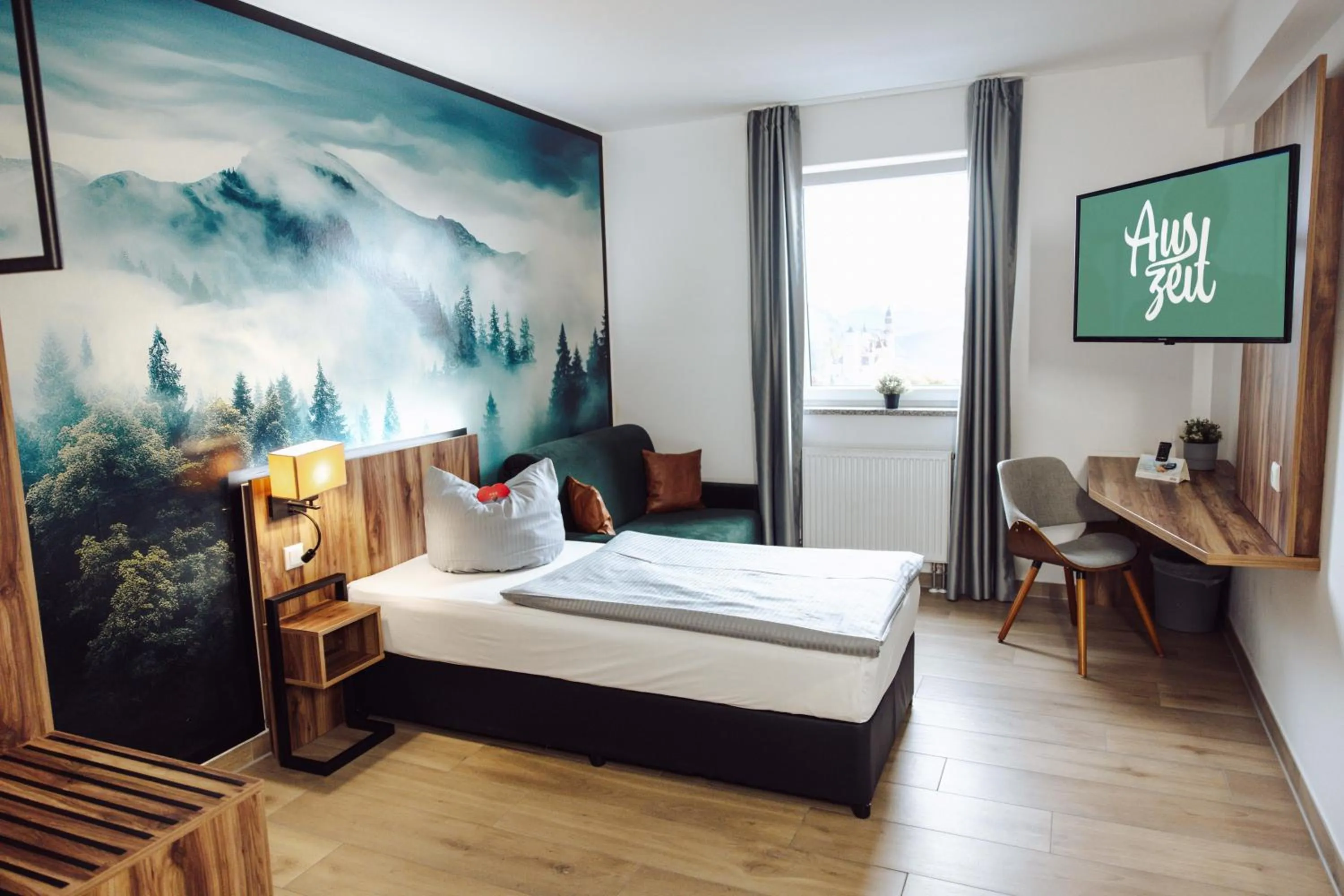 Bed in AUSZEIT DAS HOTEL Asbach-Bäumenheim