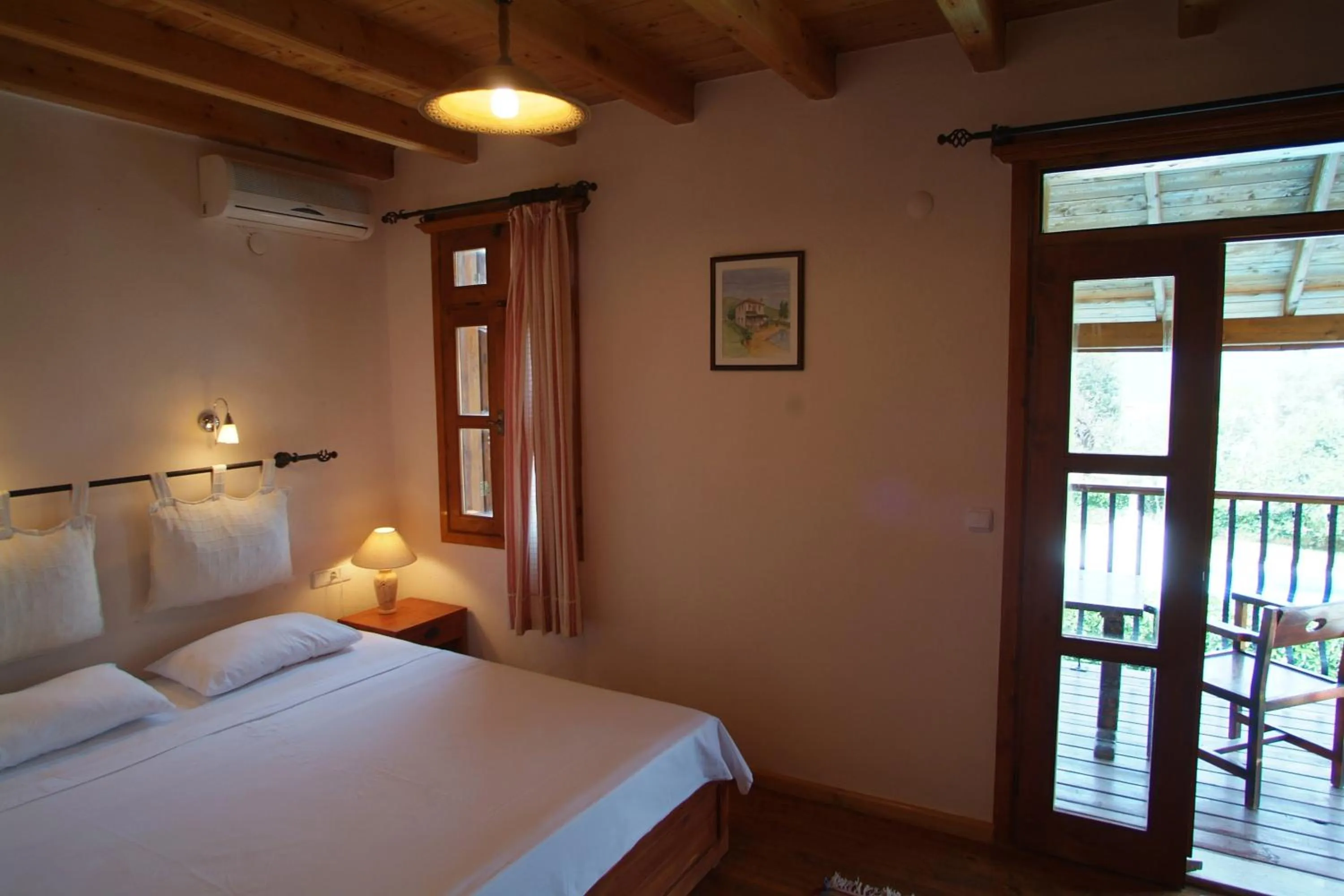 Bed in Sea Breeze Hotel and Apartments