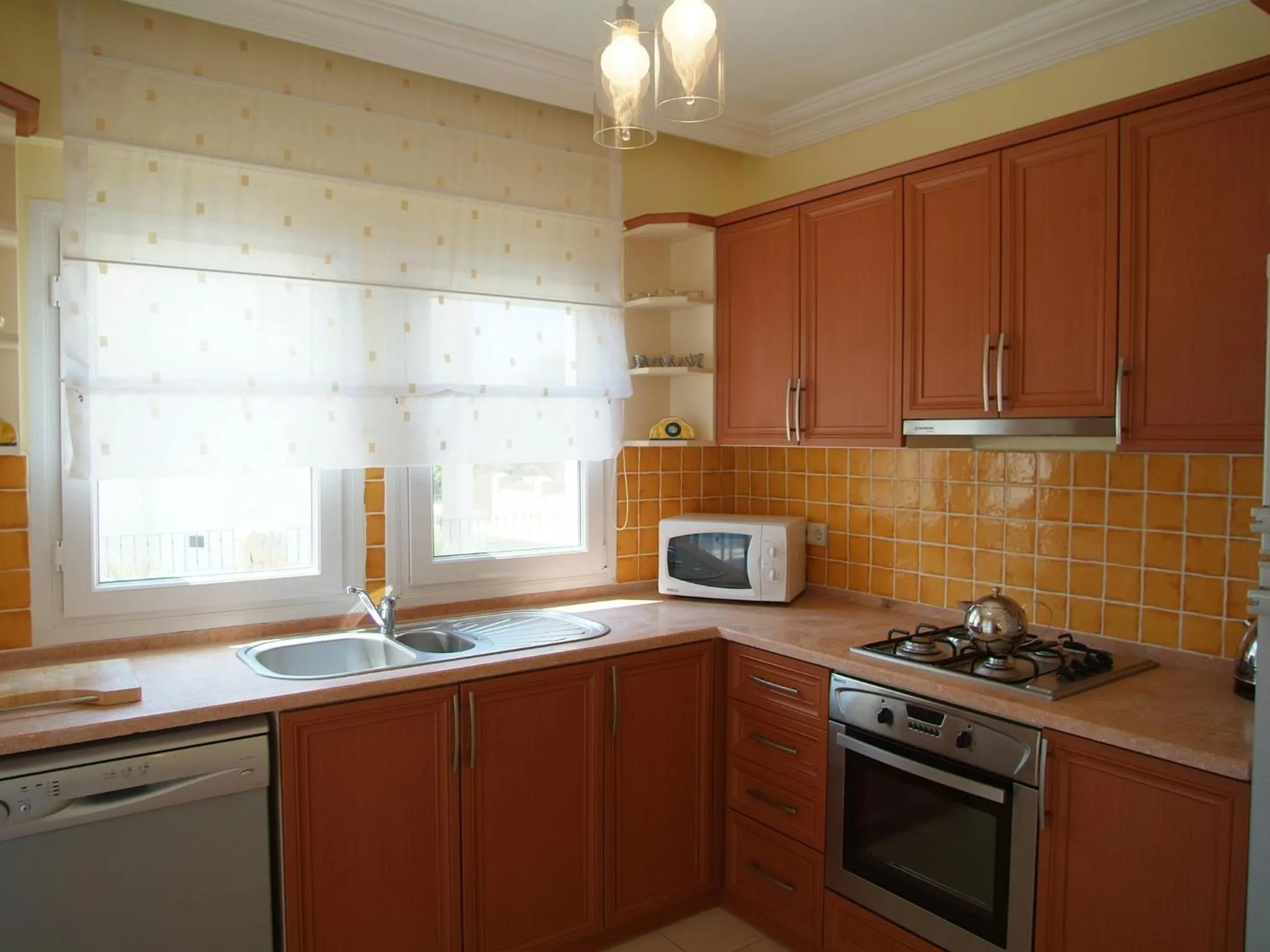 Kitchen or kitchenette in Sea Breeze Hotel and Apartments