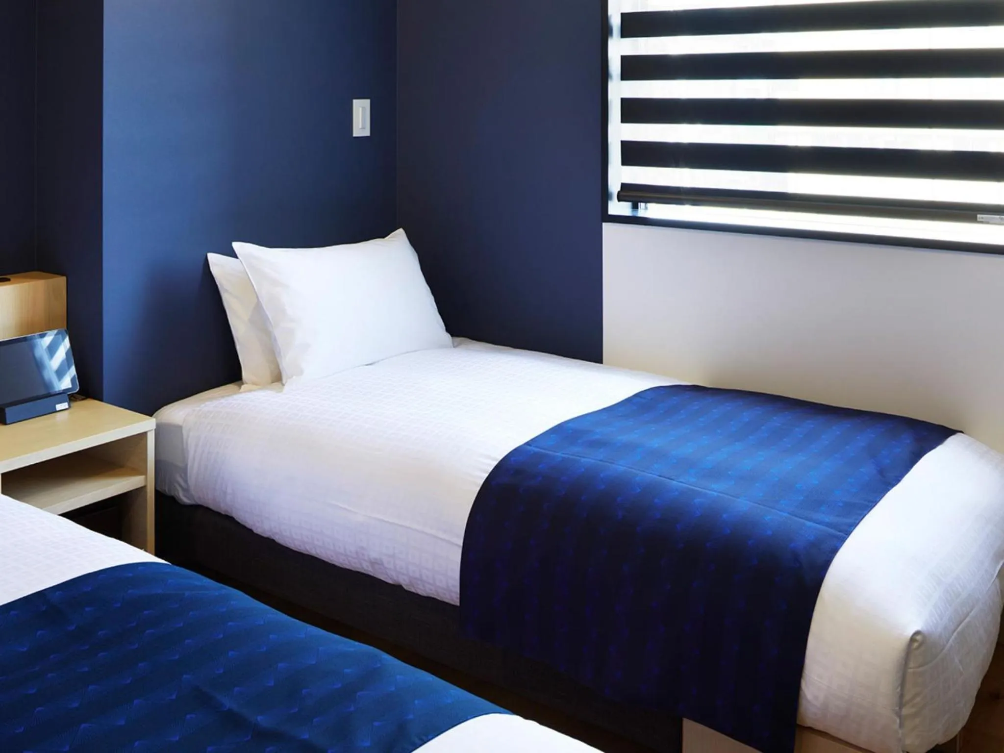 Bed in the square hotel KANAZAWA