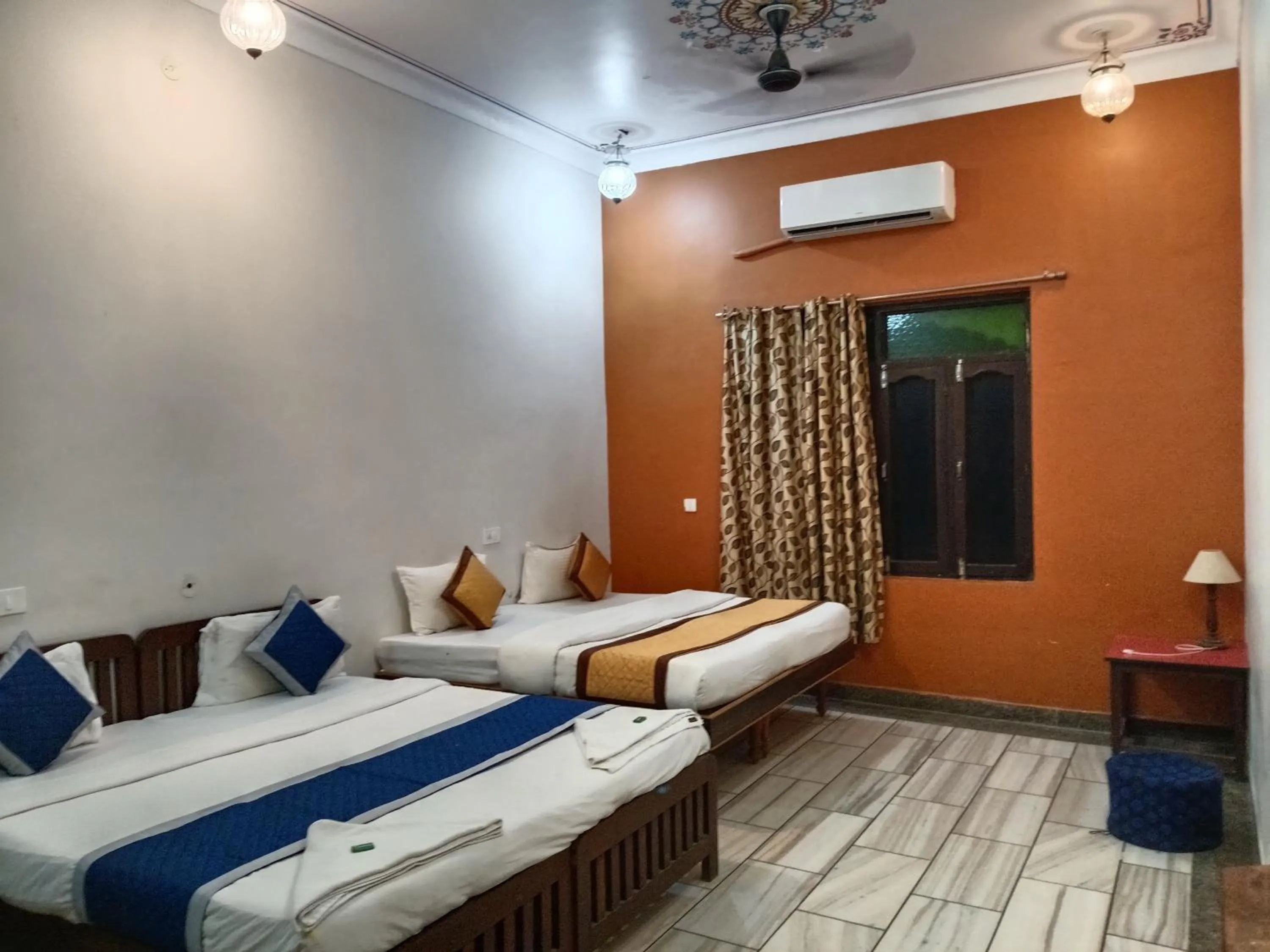 Bed in Hotel Mewad Haveli Pushkar