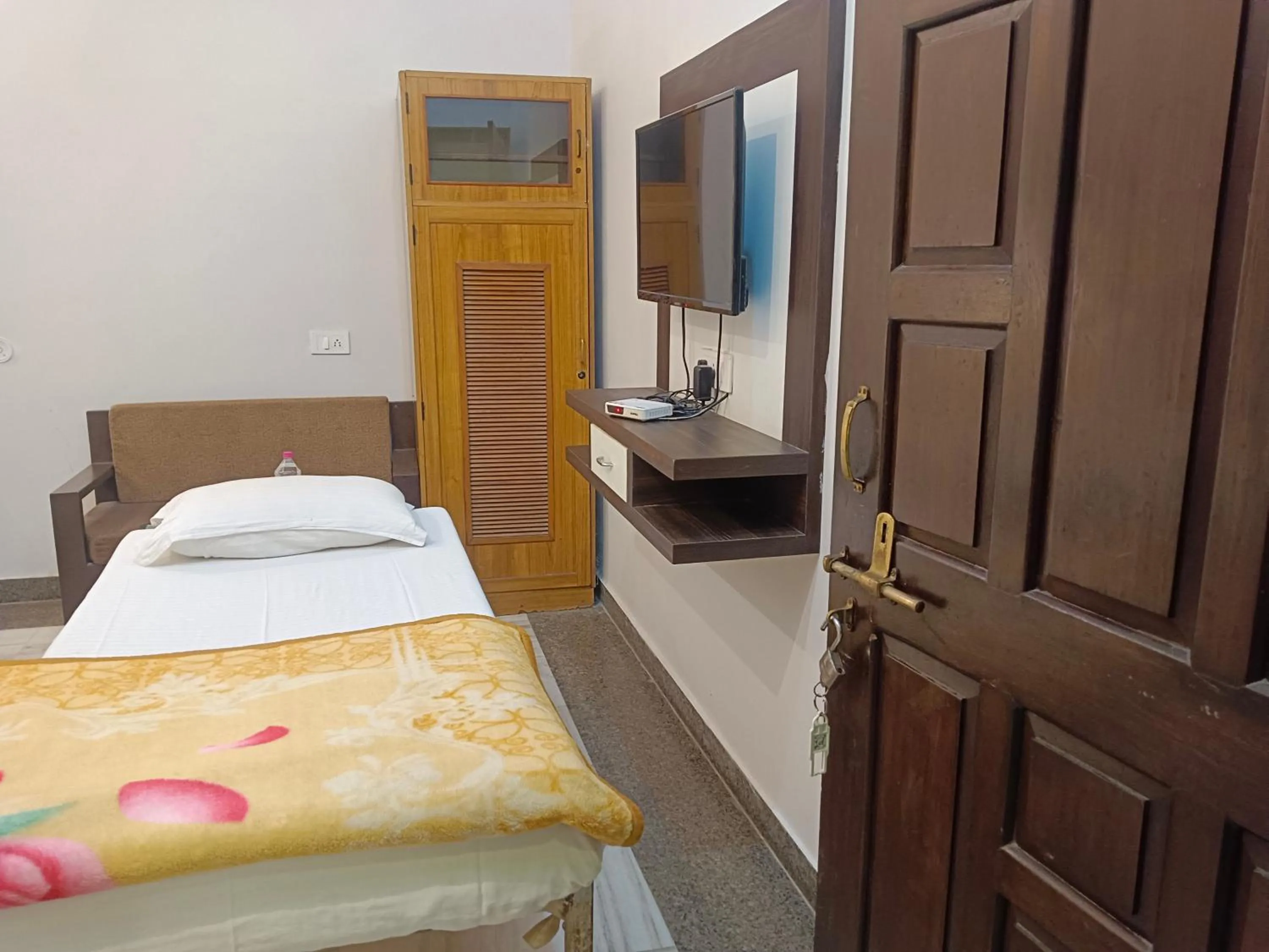 Bed in Hotel Mewad Haveli Pushkar