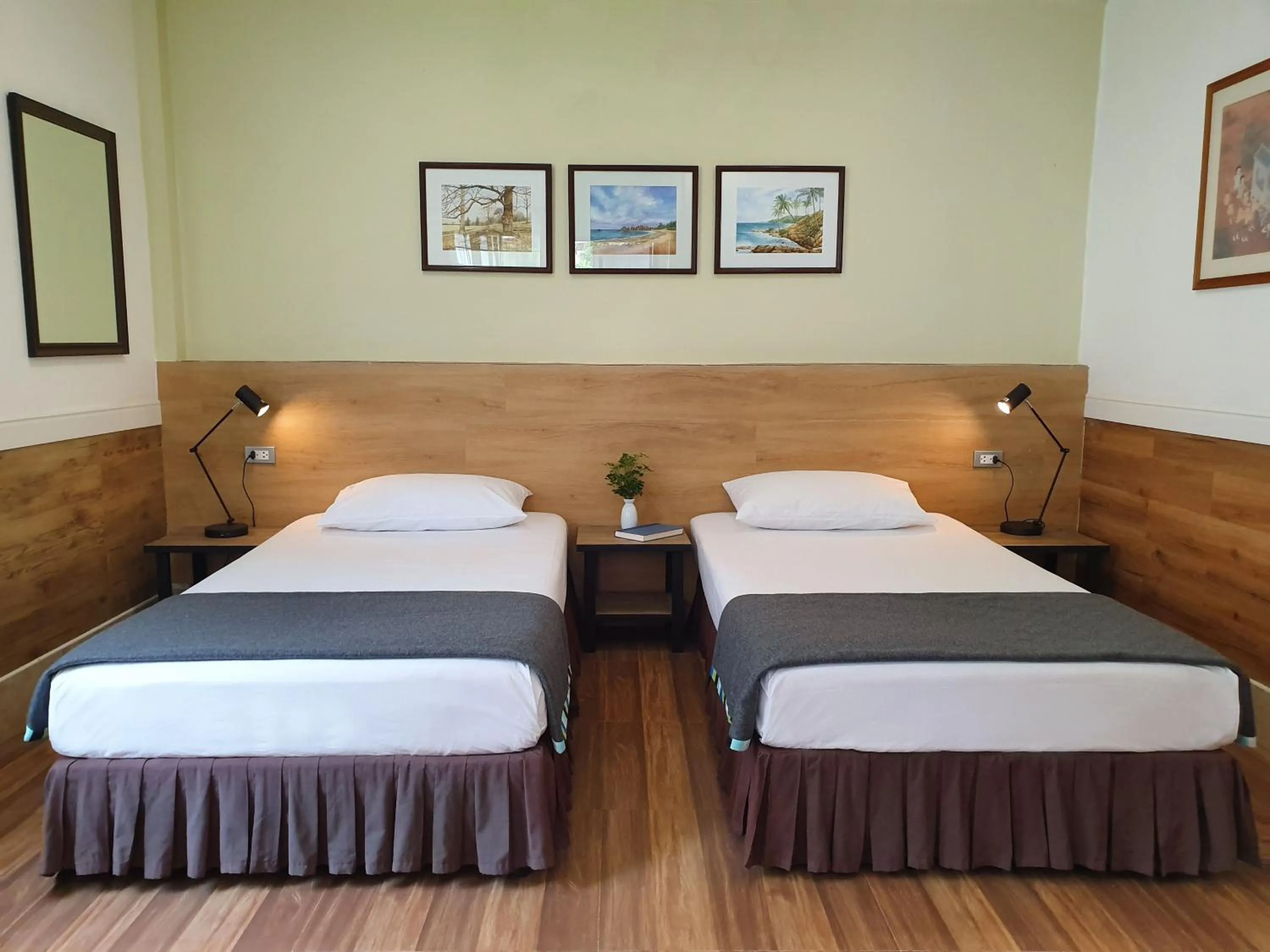 Bed in Holiday Village And Natural Garden Resort