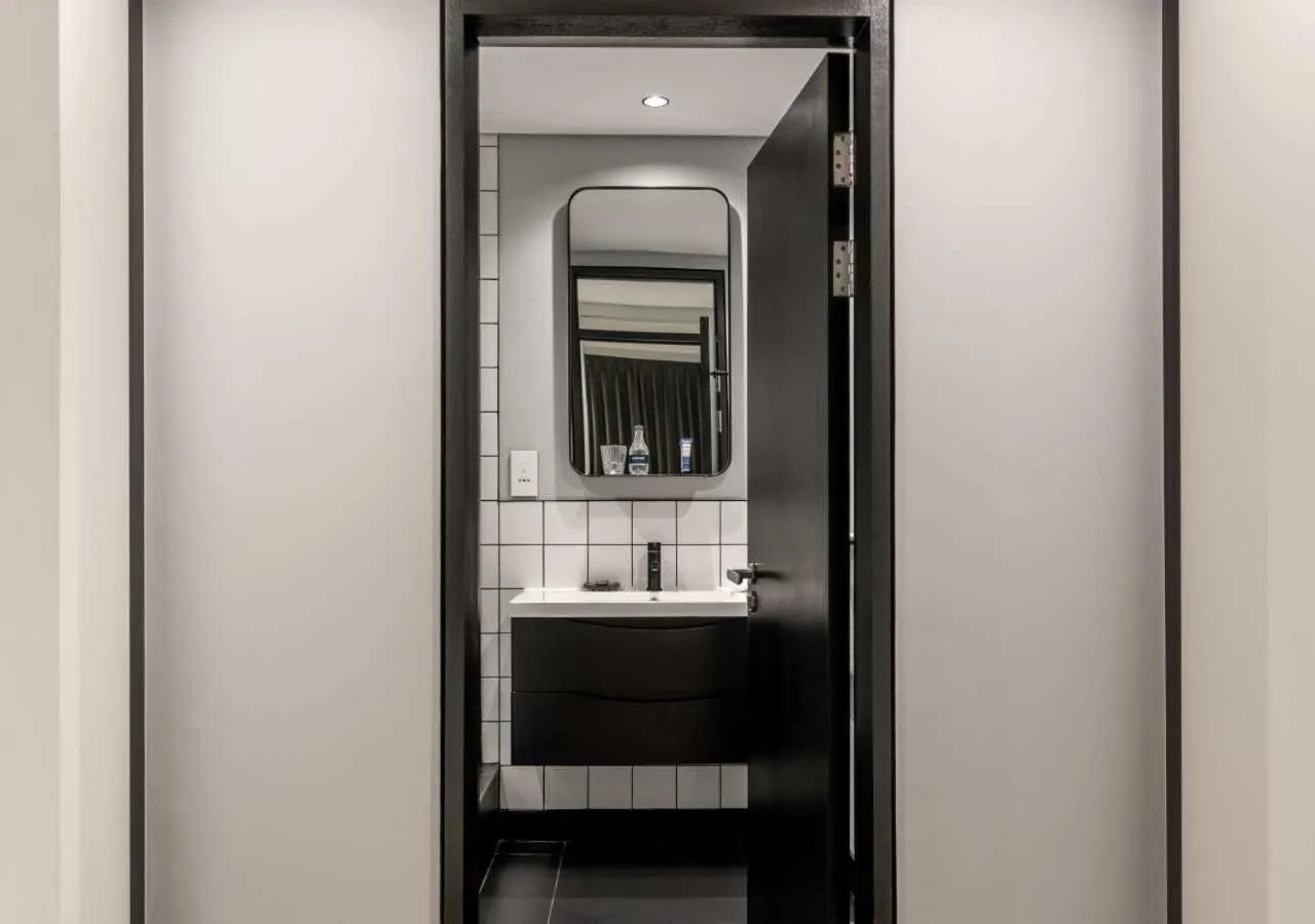 Bathroom in The Onyx Apartment Hotel by NEWMARK