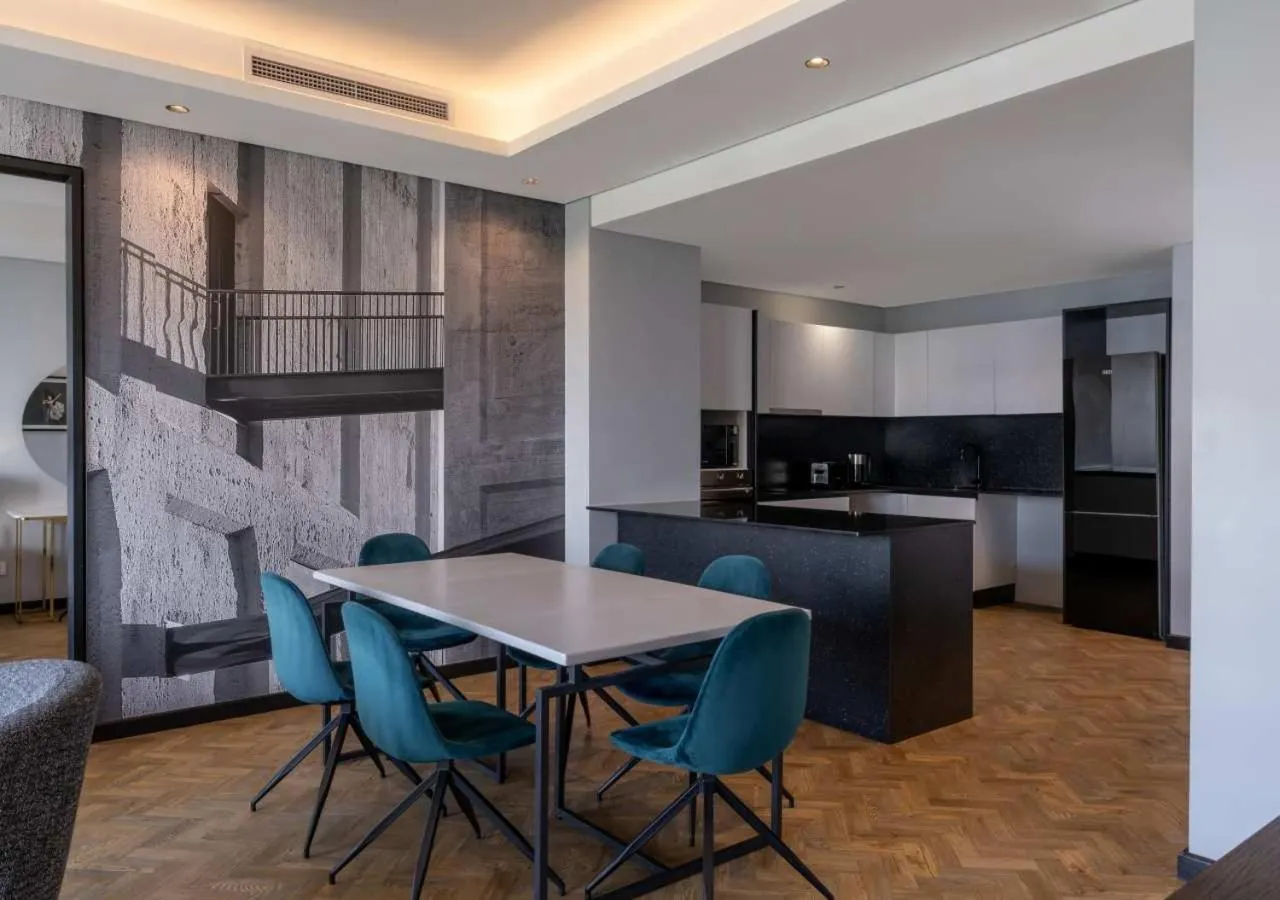 Kitchen or kitchenette in The Onyx Apartment Hotel by NEWMARK