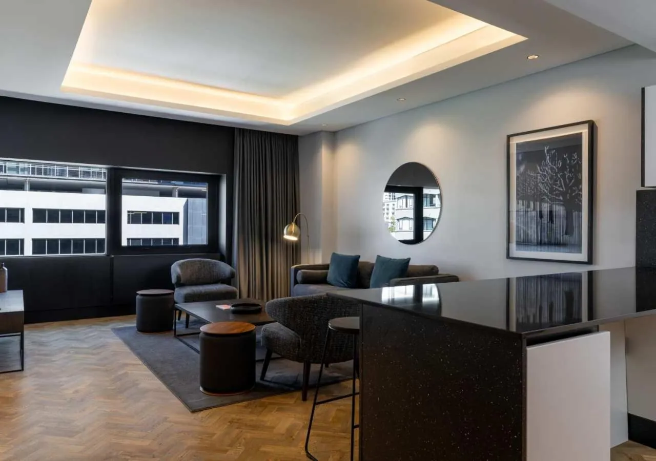 Living room in The Onyx Apartment Hotel by NEWMARK