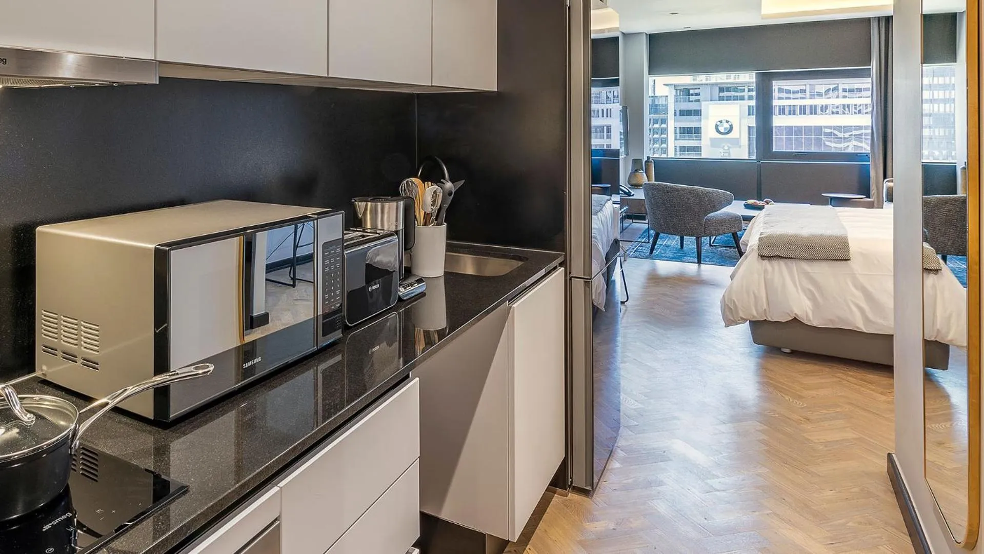 Coffee/tea facilities, Bed in The Onyx Apartment Hotel by NEWMARK