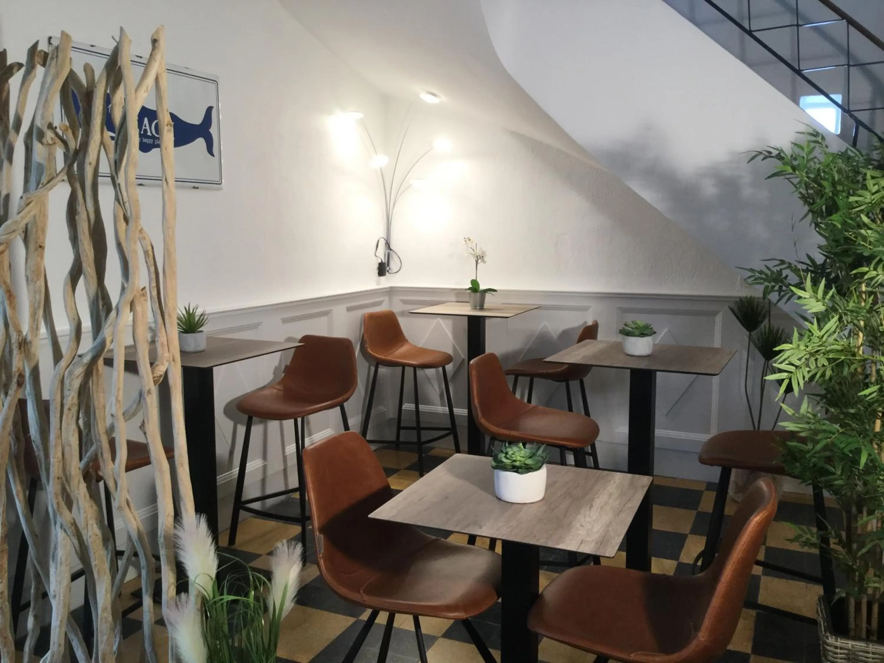 Communal lounge/ TV room in Hôtel Le Mirage