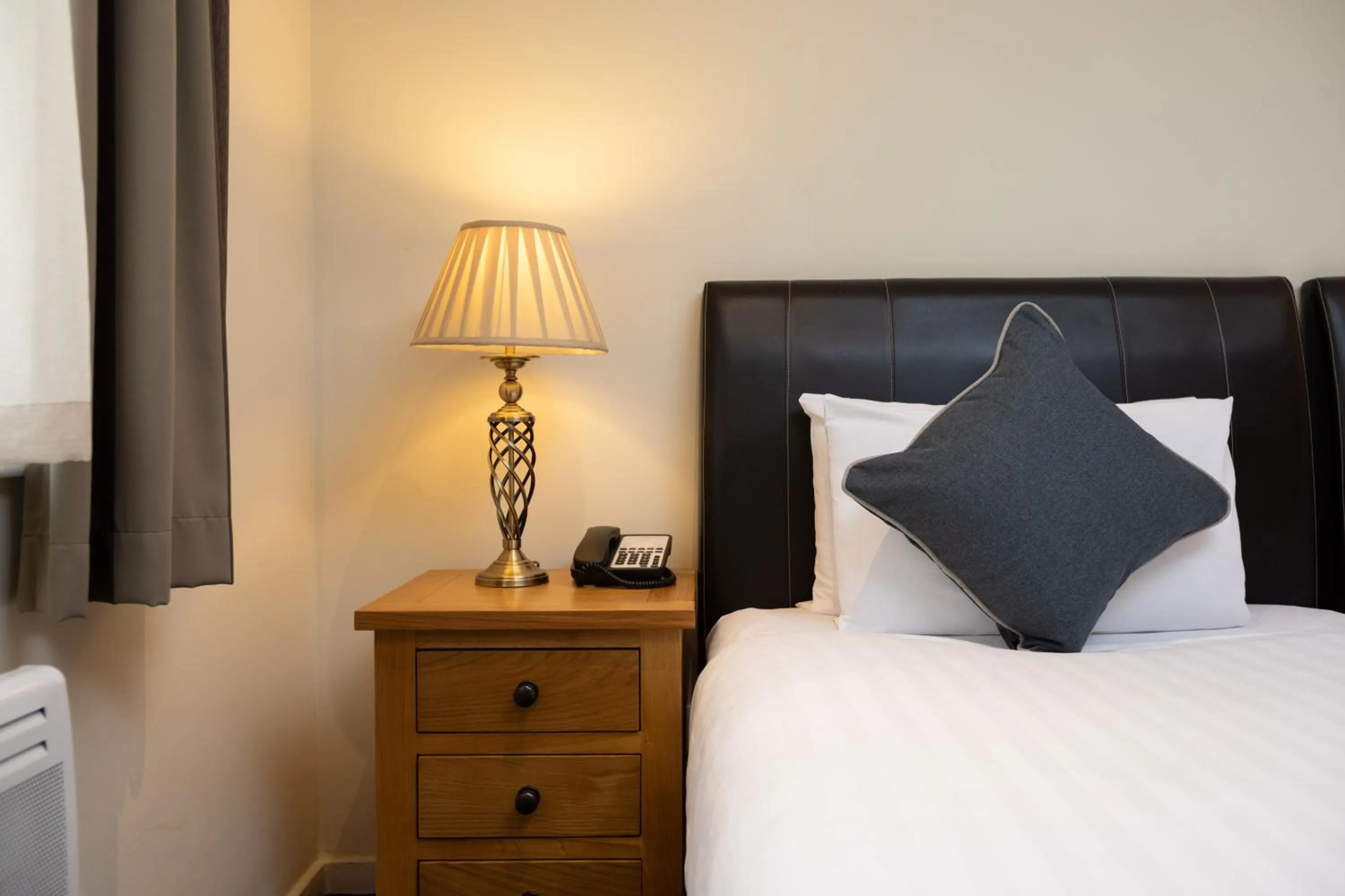 Bed in Grand Plaza Serviced Apartments