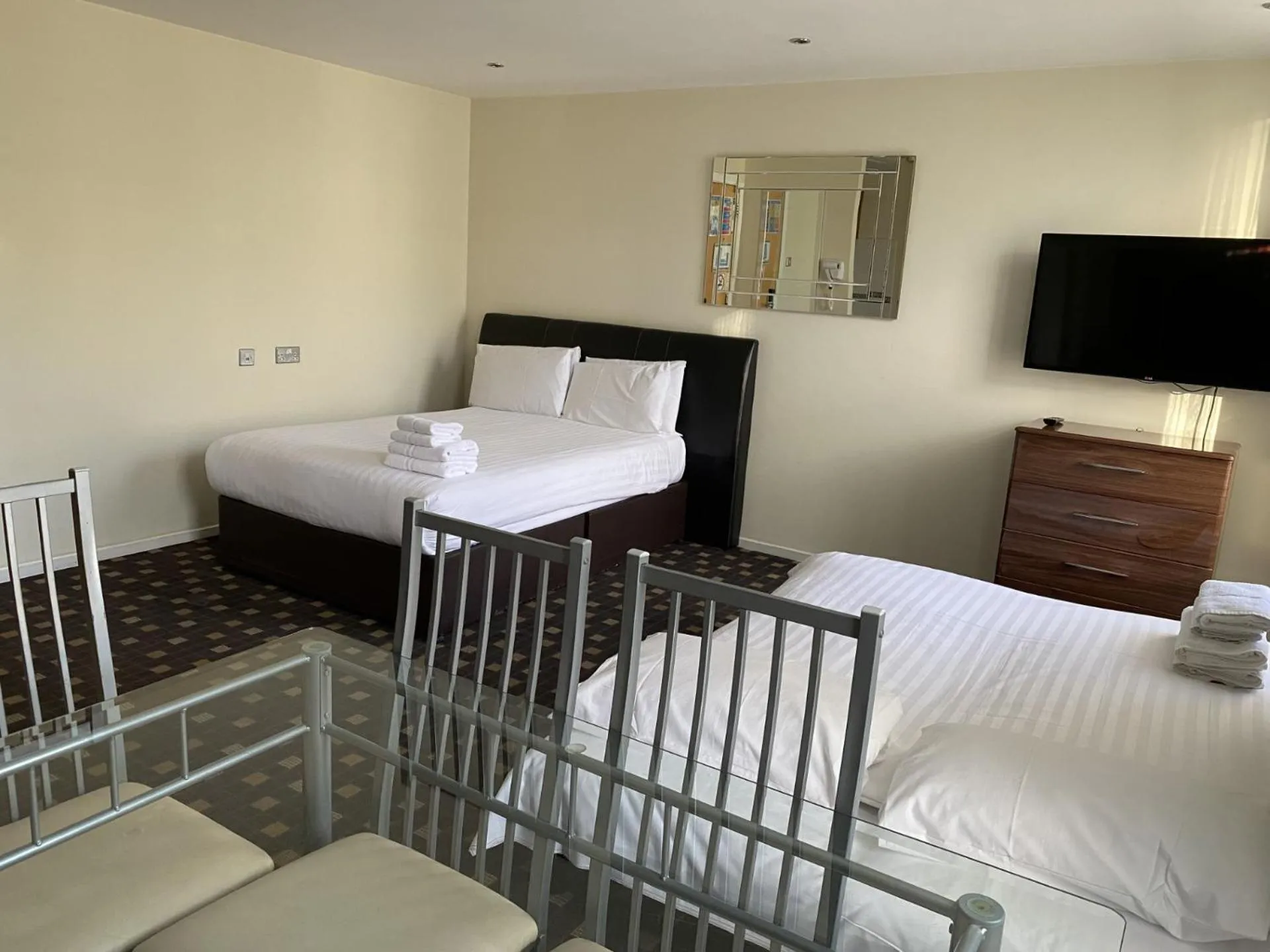 Living room, Bed in Grand Plaza Serviced Apartments