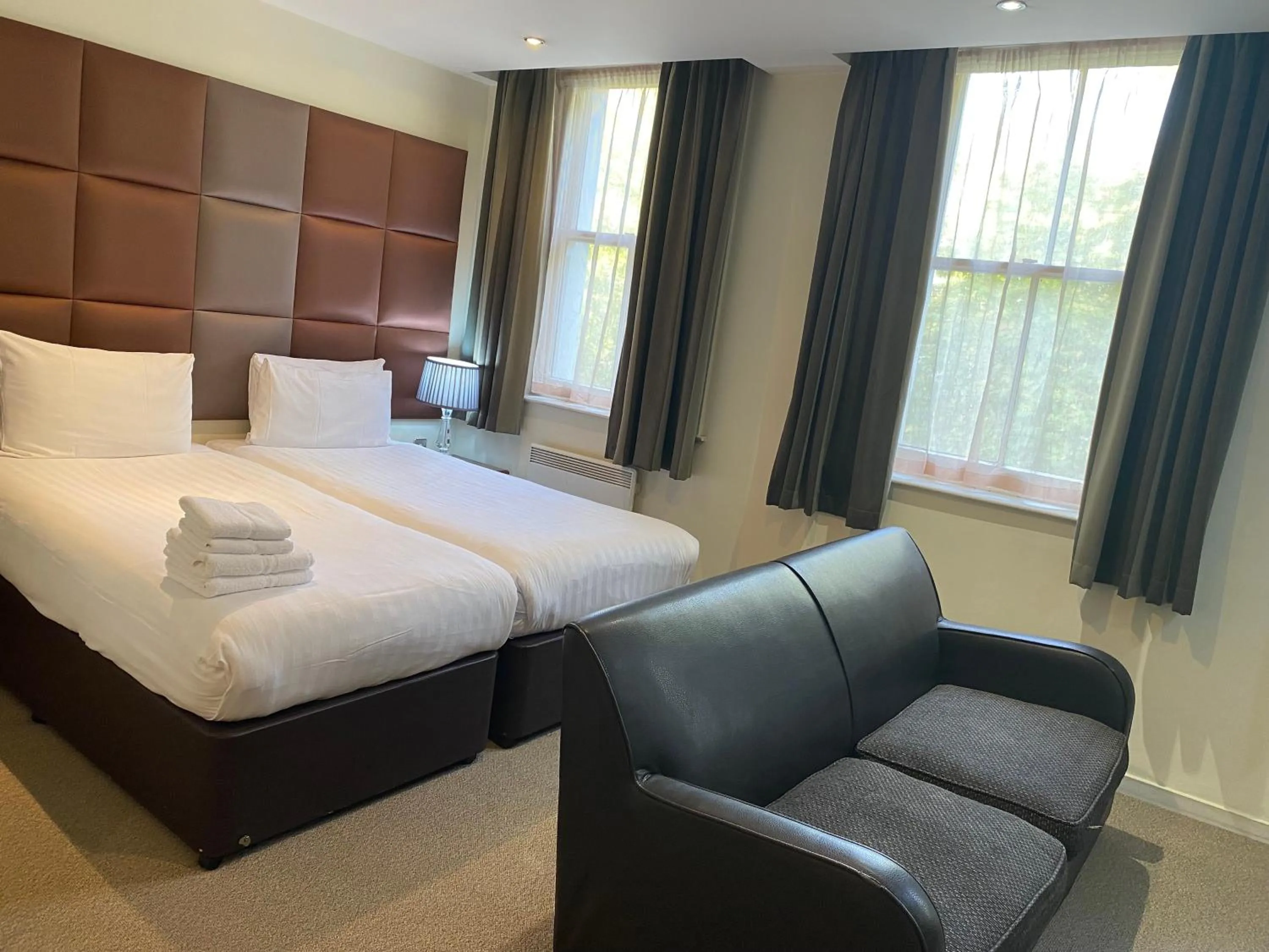 Bed in Grand Plaza Serviced Apartments