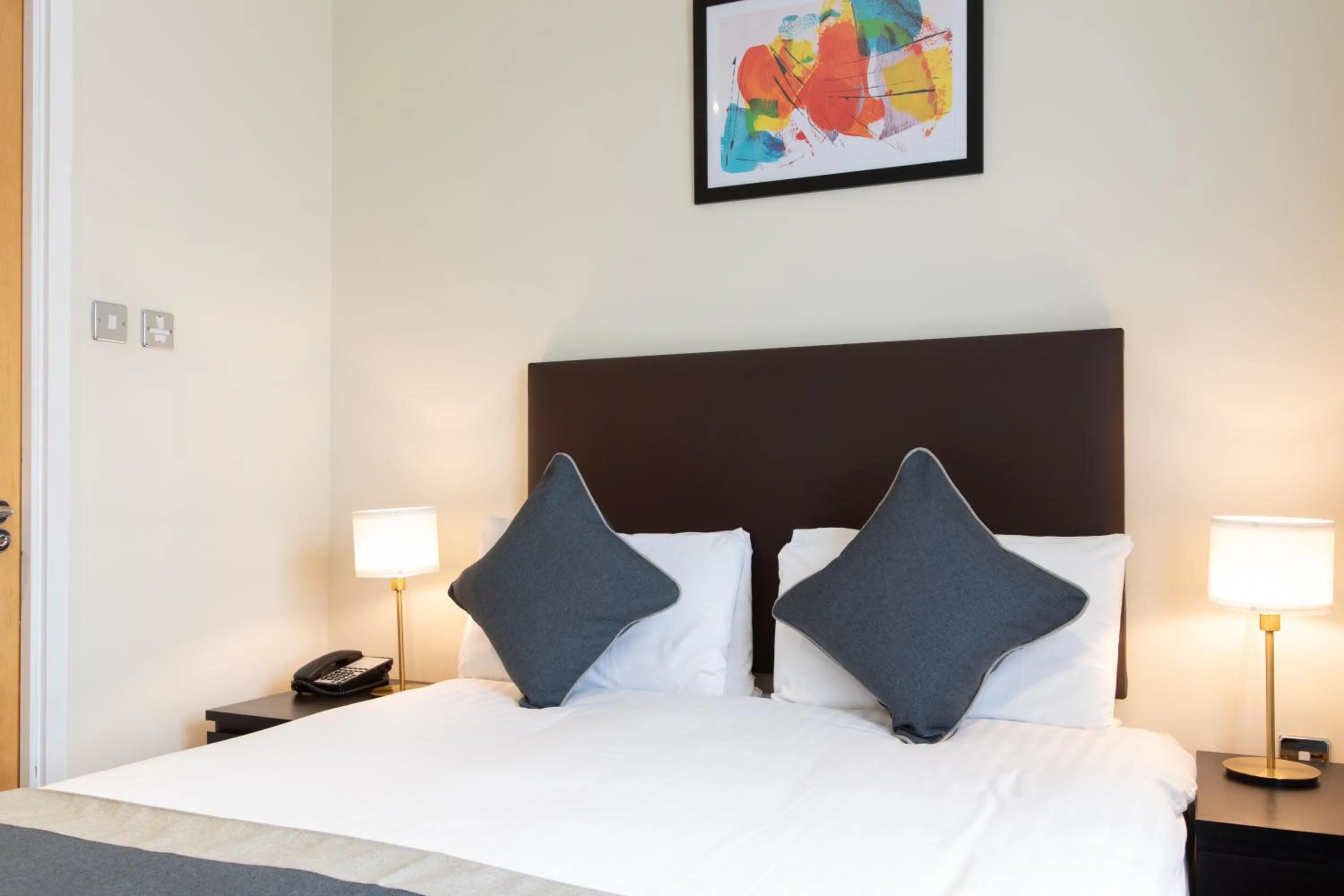 Bed in Grand Plaza Serviced Apartments