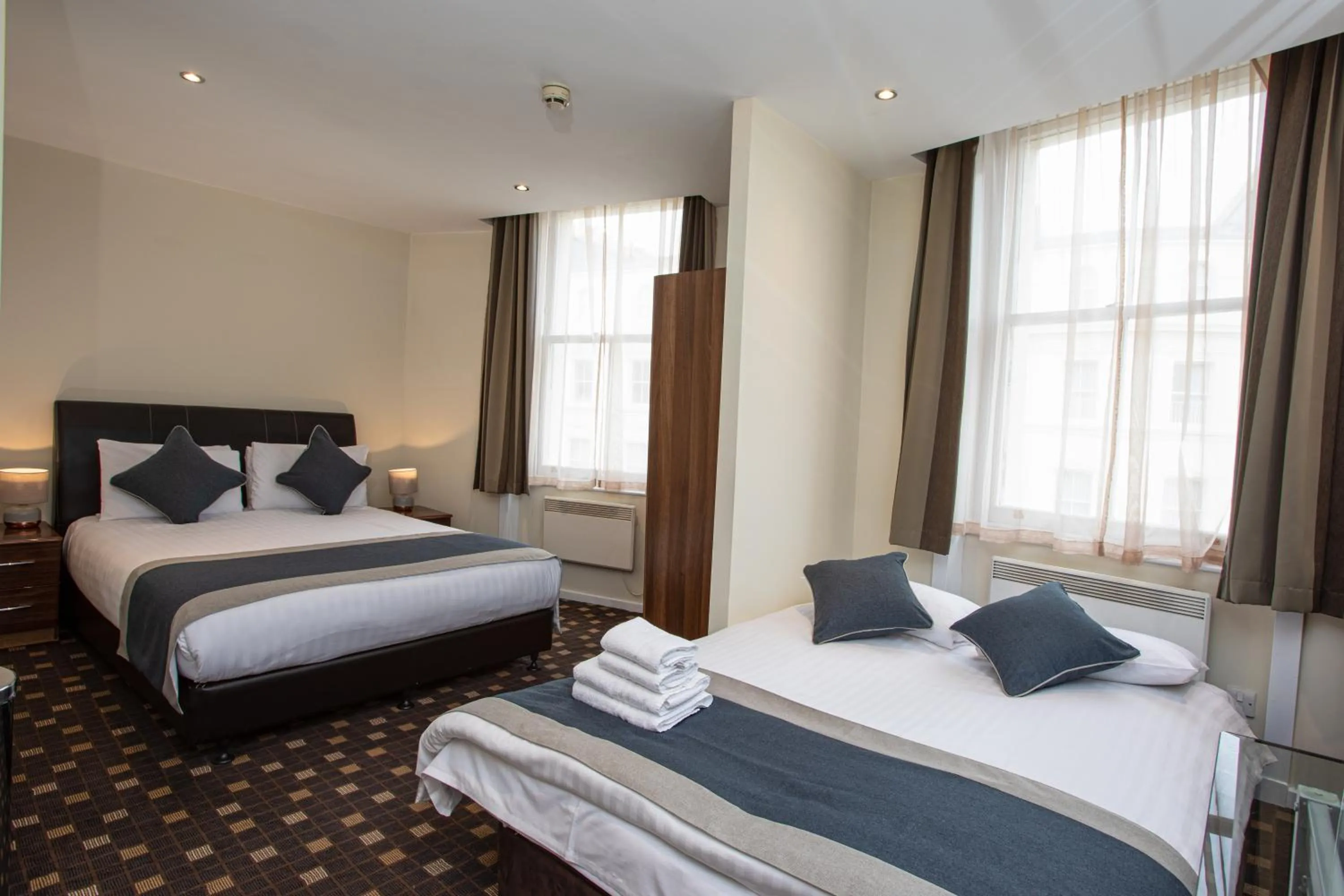 Bed in Grand Plaza Serviced Apartments